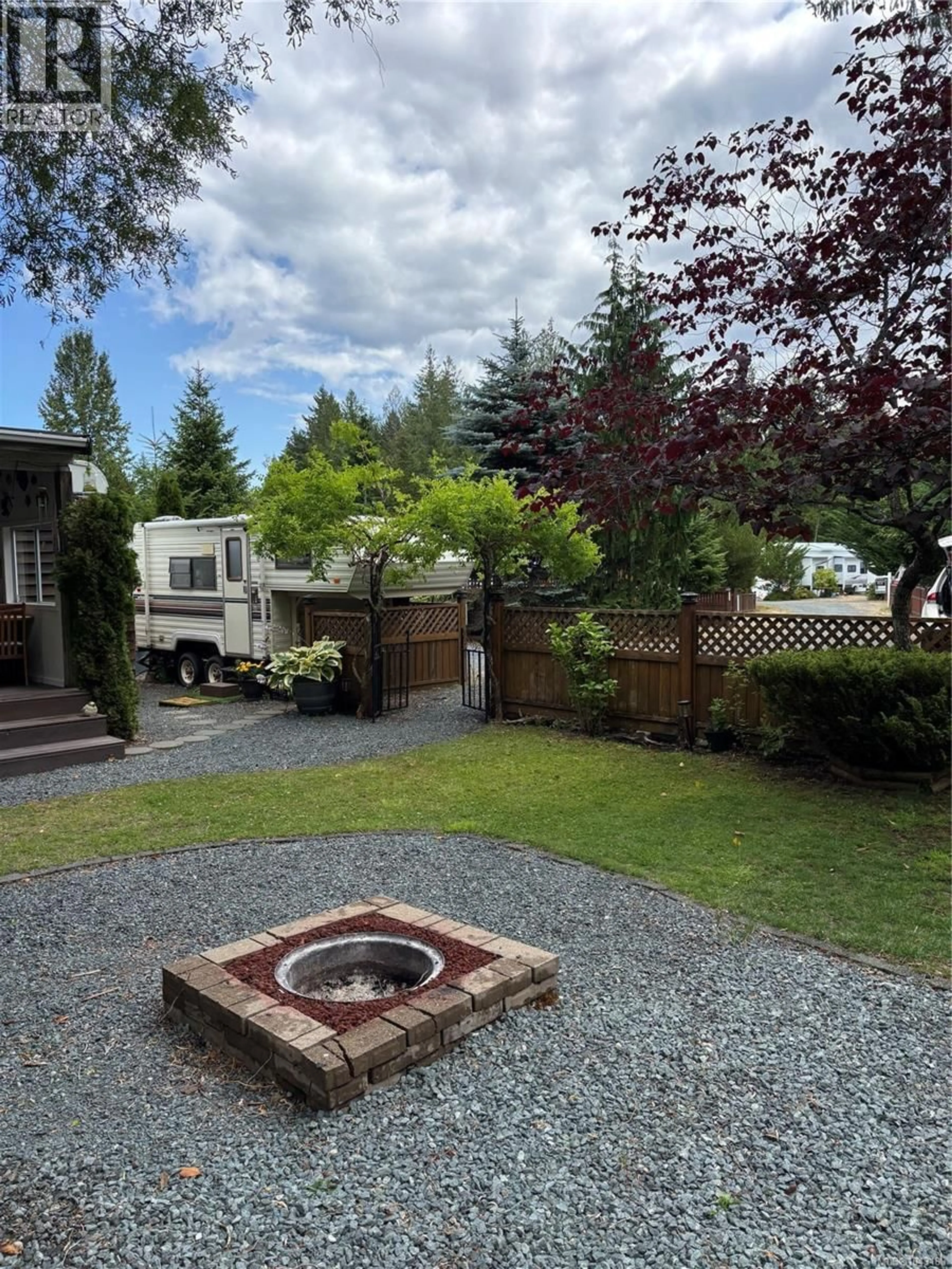 A pic from outside/outdoor area/front of a property/back of a property/a pic from drone, street for G8 - 2650 TURNBULL ROAD, Qualicum Beach British Columbia V9K2R2