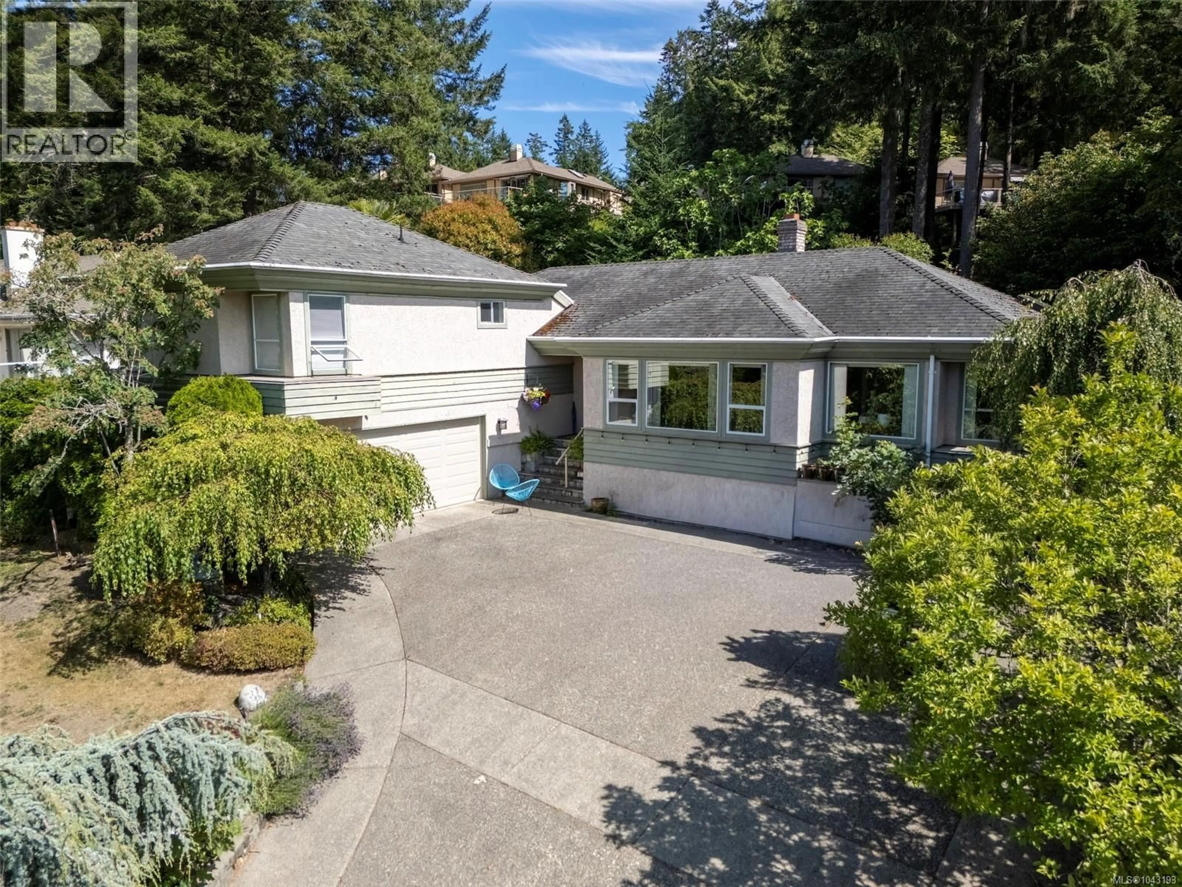 A pic from outside/outdoor area/front of a property/back of a property/a pic from drone, street for 4343 EMILY CARR DRIVE, Saanich British Columbia V8X5E4