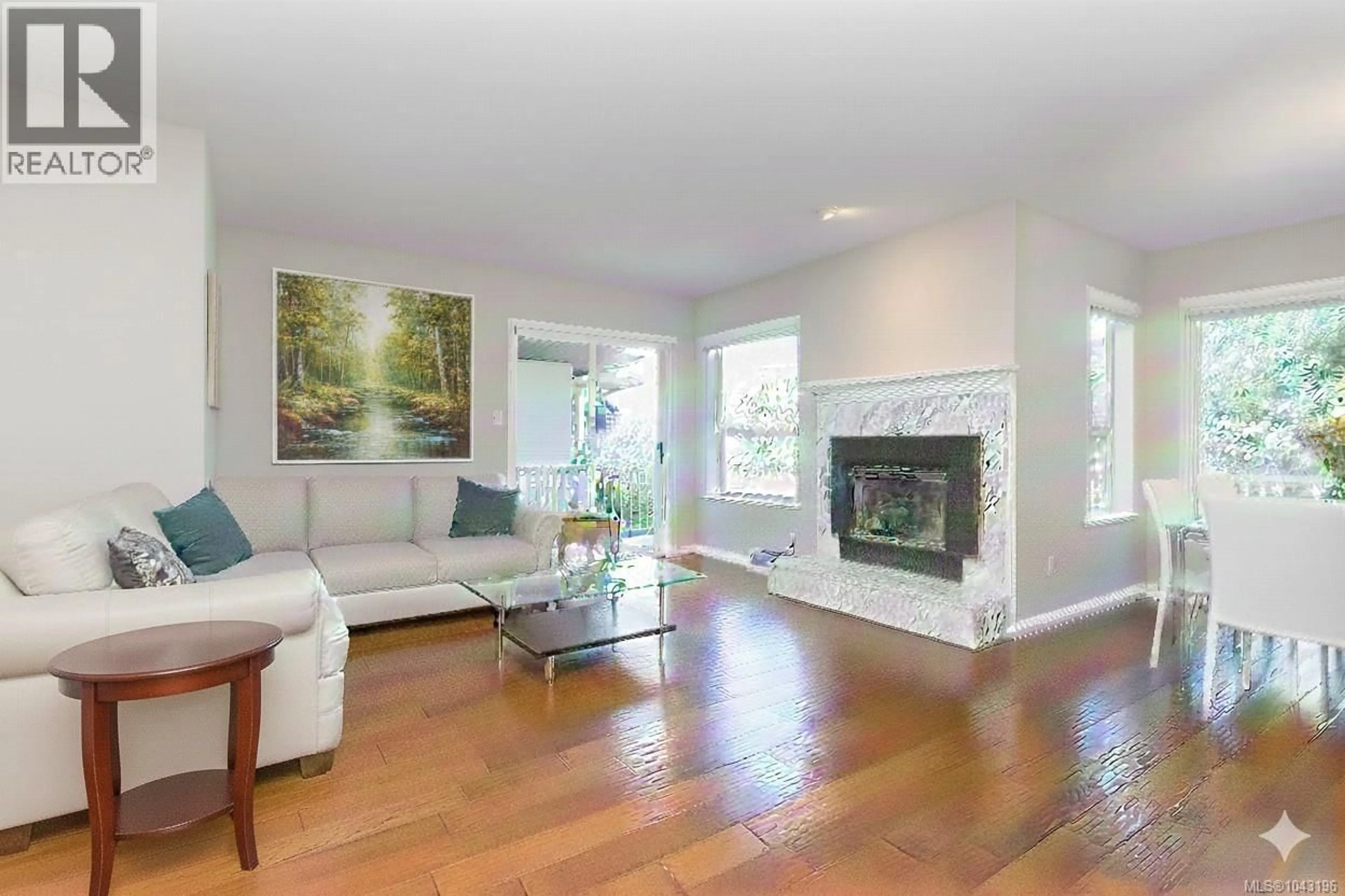 Living room with furniture, wood/laminate floor for 537 FAIRWAYS PLACE, Cobble Hill British Columbia V8H0K8