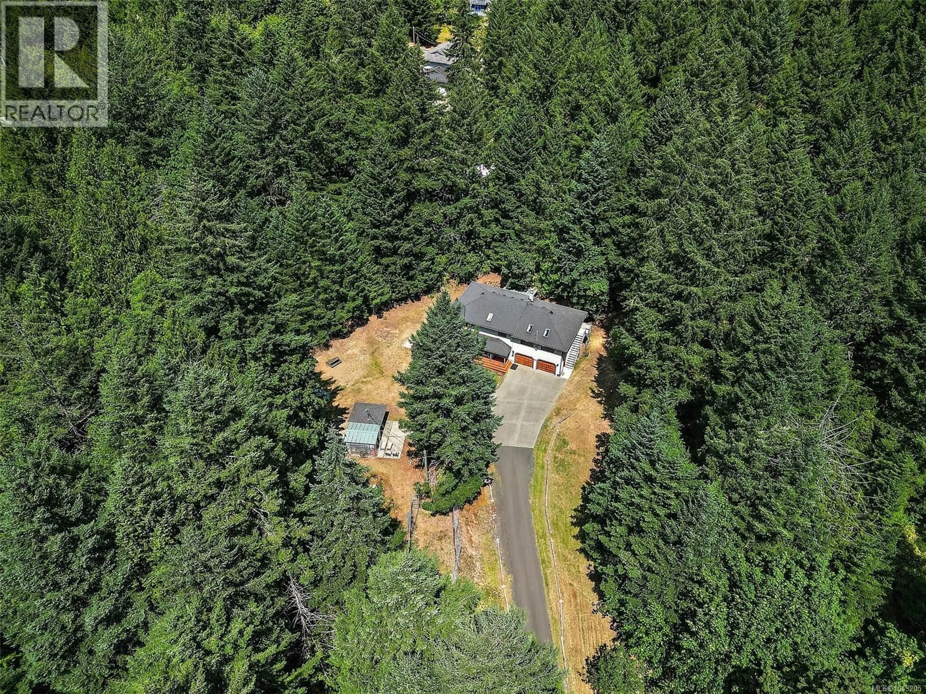A pic from outside/outdoor area/front of a property/back of a property/a pic from drone, forest/trees view for 418 QUAIL PLACE, Highlands British Columbia V9B6G2
