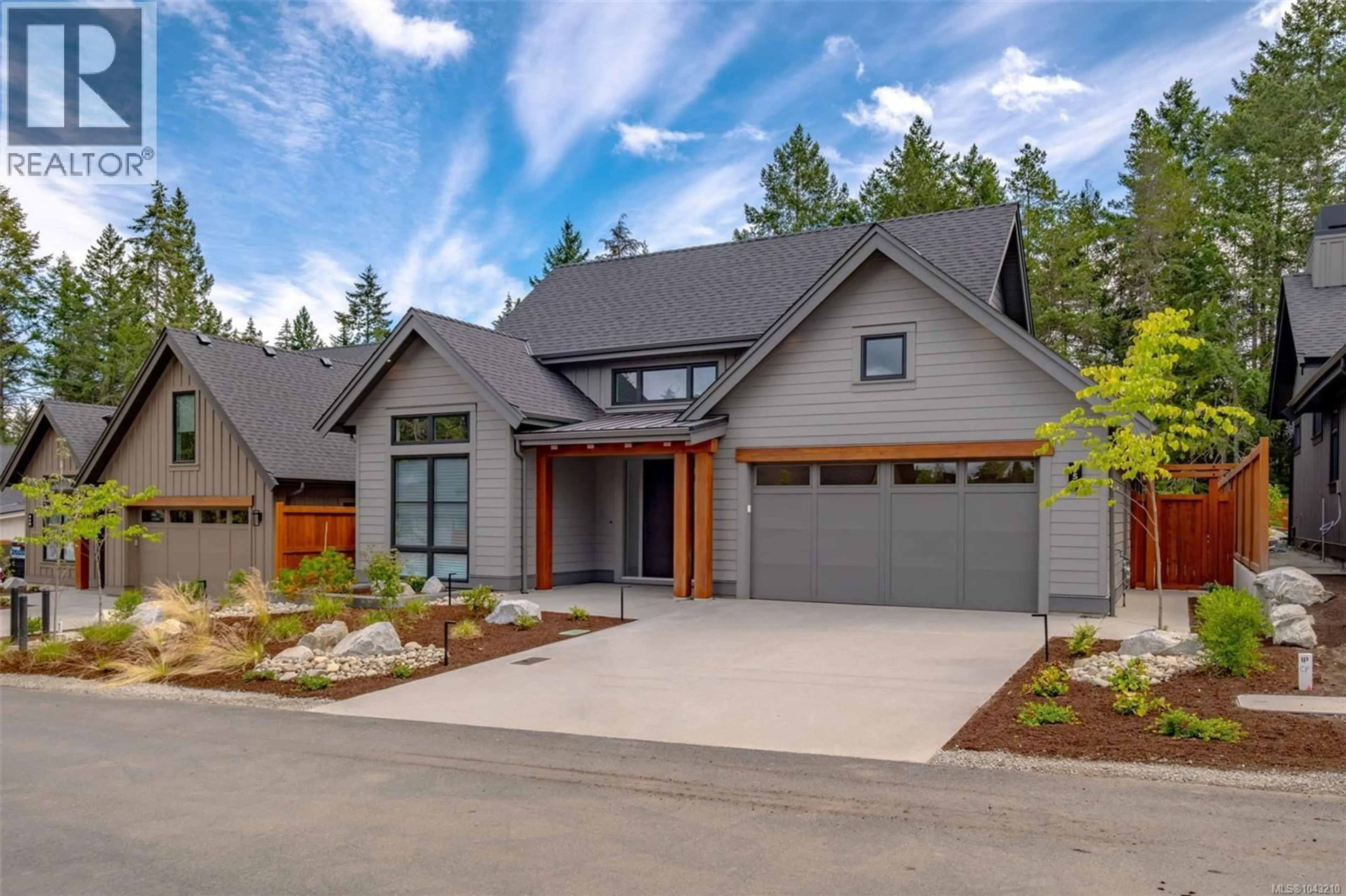Home with brick exterior material, street for 519 HOLE-IN-ONE DRIVE, Qualicum Beach British Columbia V9K1B0