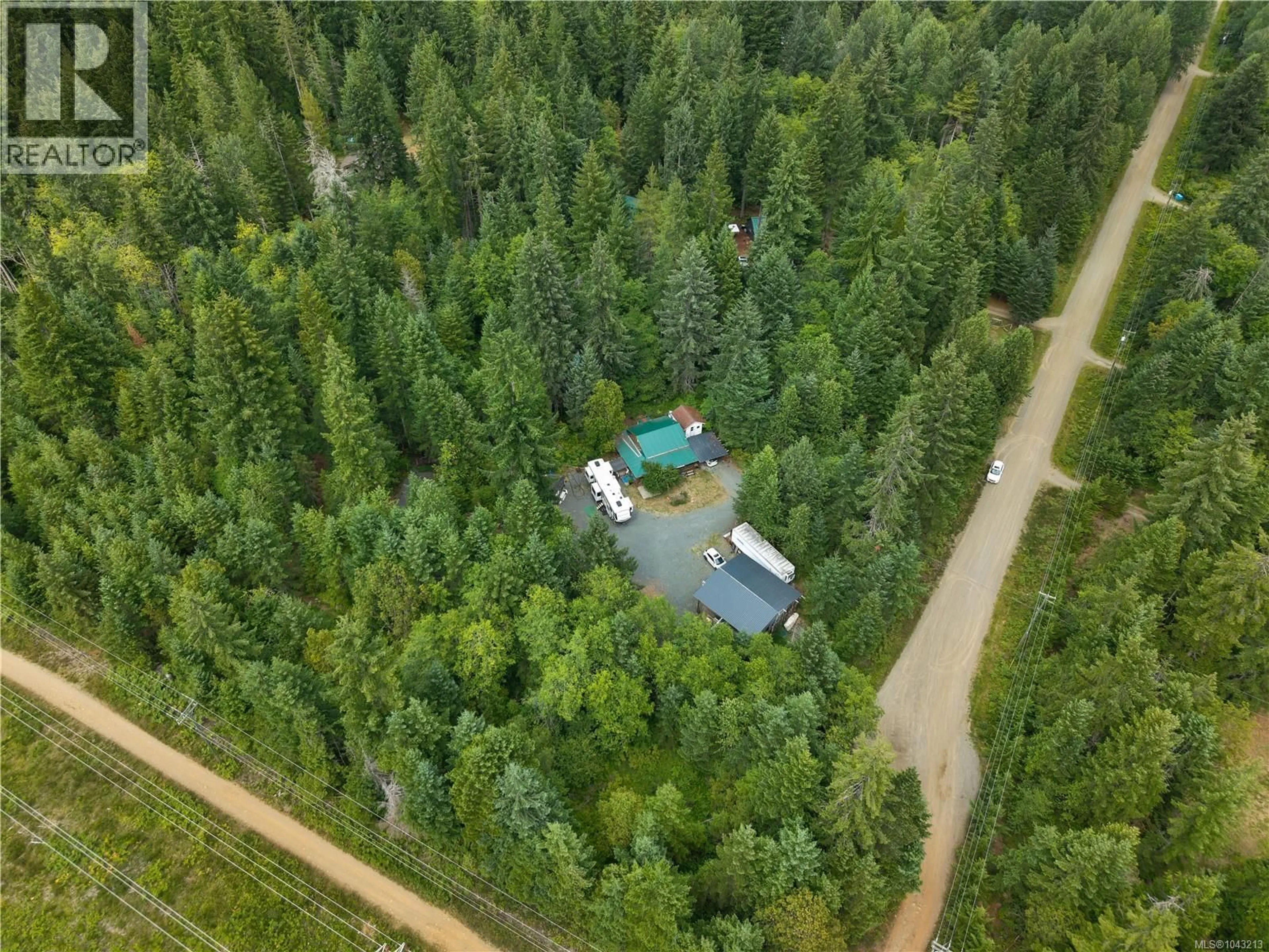A pic from outside/outdoor area/front of a property/back of a property/a pic from drone, forest/trees view for 3866 PINECREST ROAD, Black Creek British Columbia V9J1E6