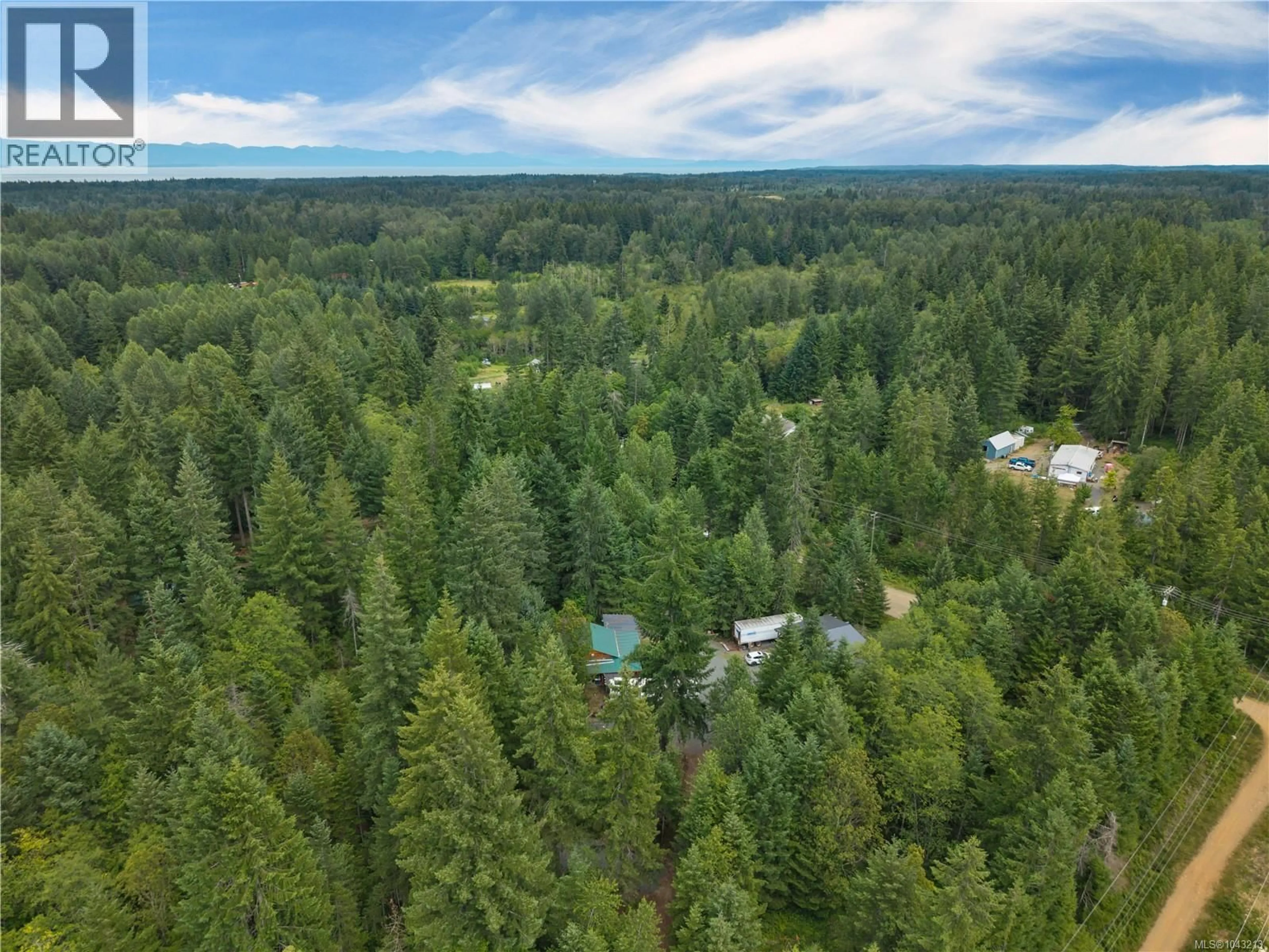 A pic from outside/outdoor area/front of a property/back of a property/a pic from drone, forest/trees view for 3866 PINECREST ROAD, Black Creek British Columbia V9J1E6