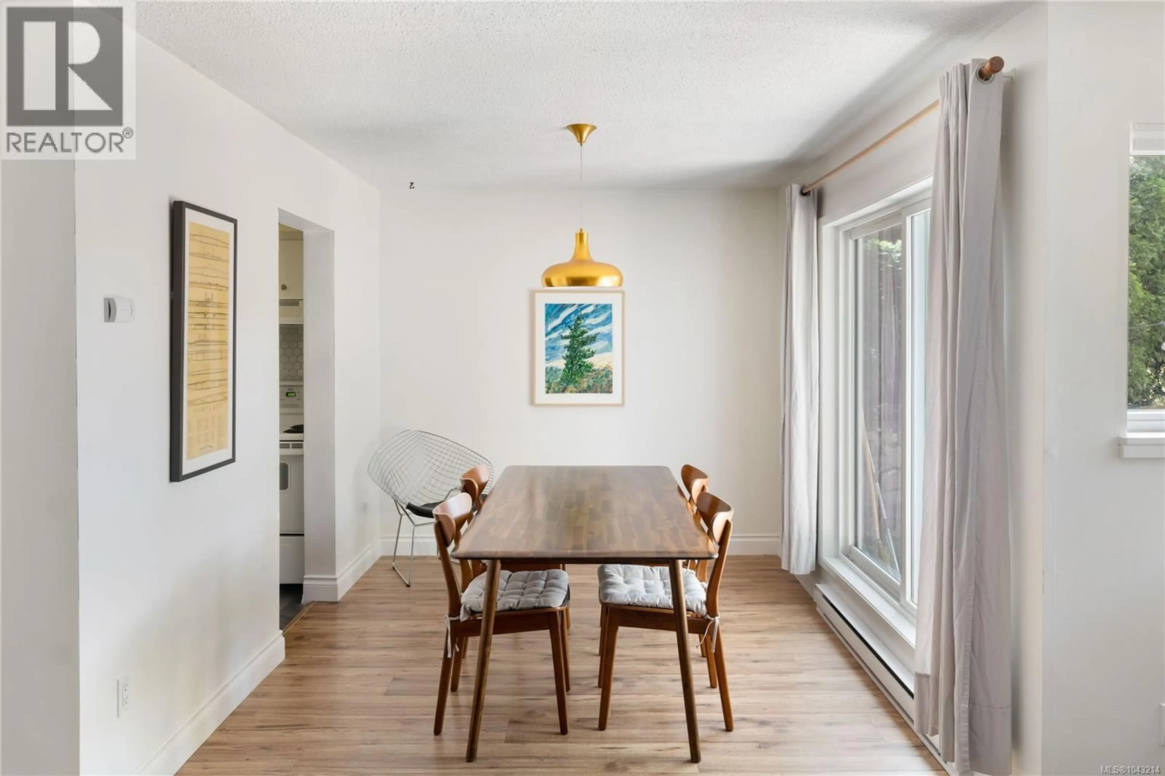 Dining room, wood/laminate floor for 103 - 1366 HILLSIDE AVENUE, Victoria British Columbia V8T2B5