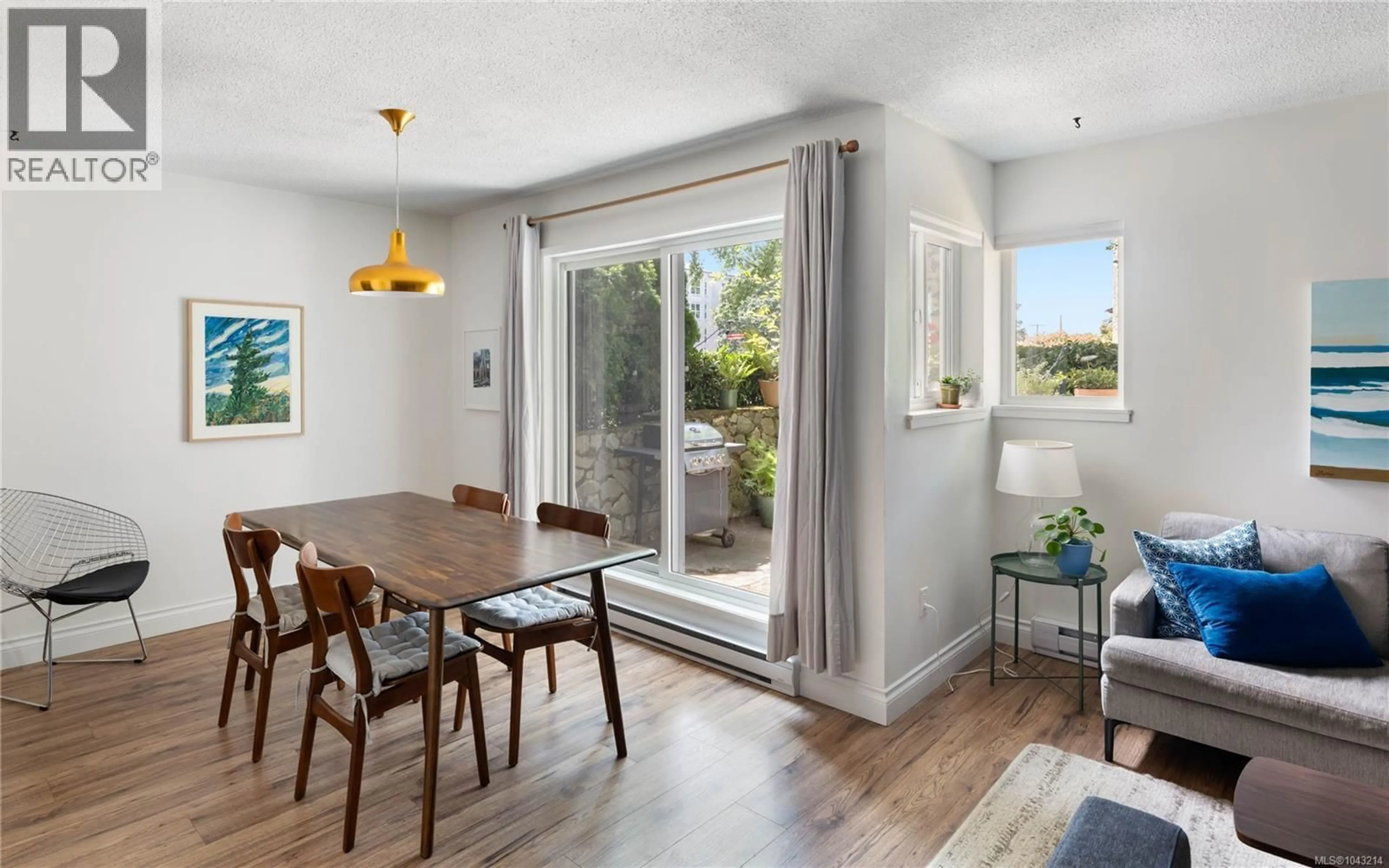 Dining room, wood/laminate floor for 103 - 1366 HILLSIDE AVENUE, Victoria British Columbia V8T2B5