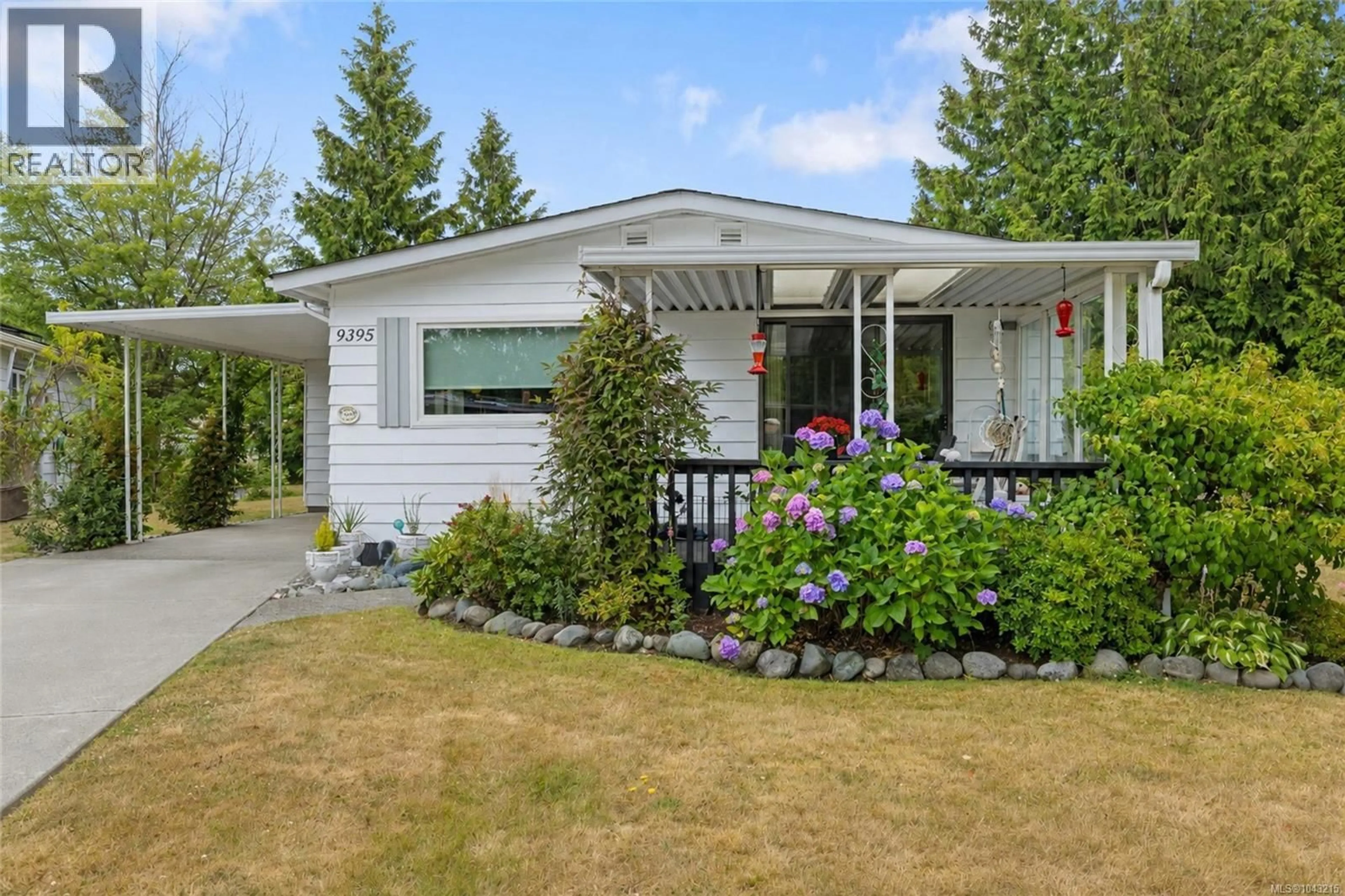 Home with vinyl exterior material, street for 9395 LAURIES LANE, Sidney British Columbia V8L4L2