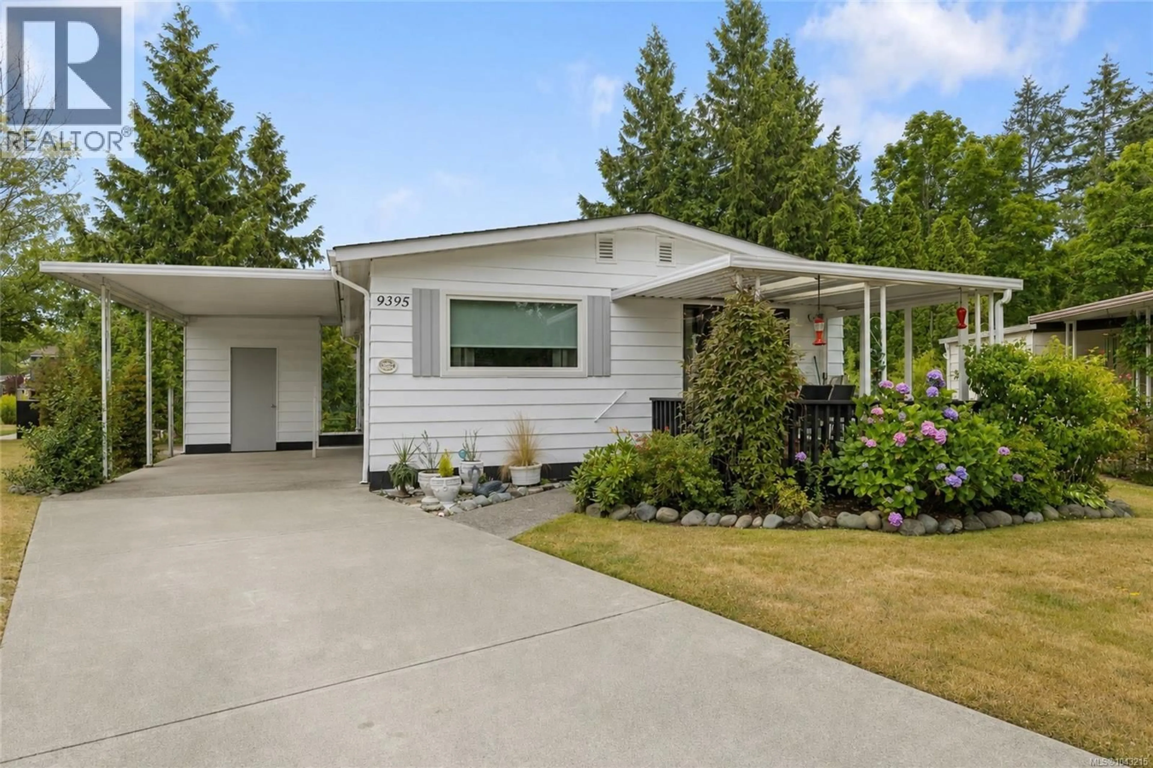 Home with vinyl exterior material, street for 9395 LAURIES LANE, Sidney British Columbia V8L4L2