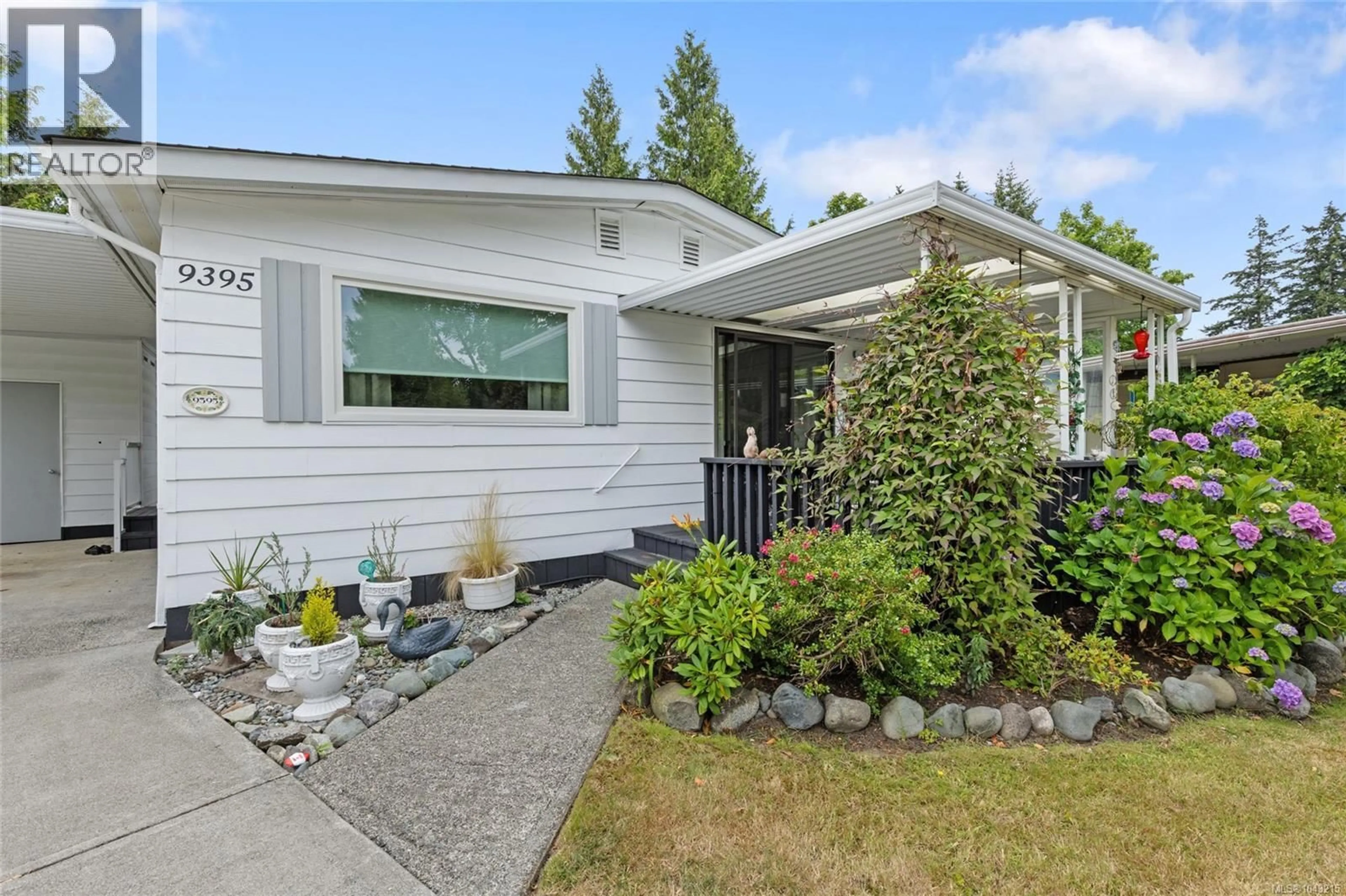 Home with vinyl exterior material, street for 9395 LAURIES LANE, Sidney British Columbia V8L4L2