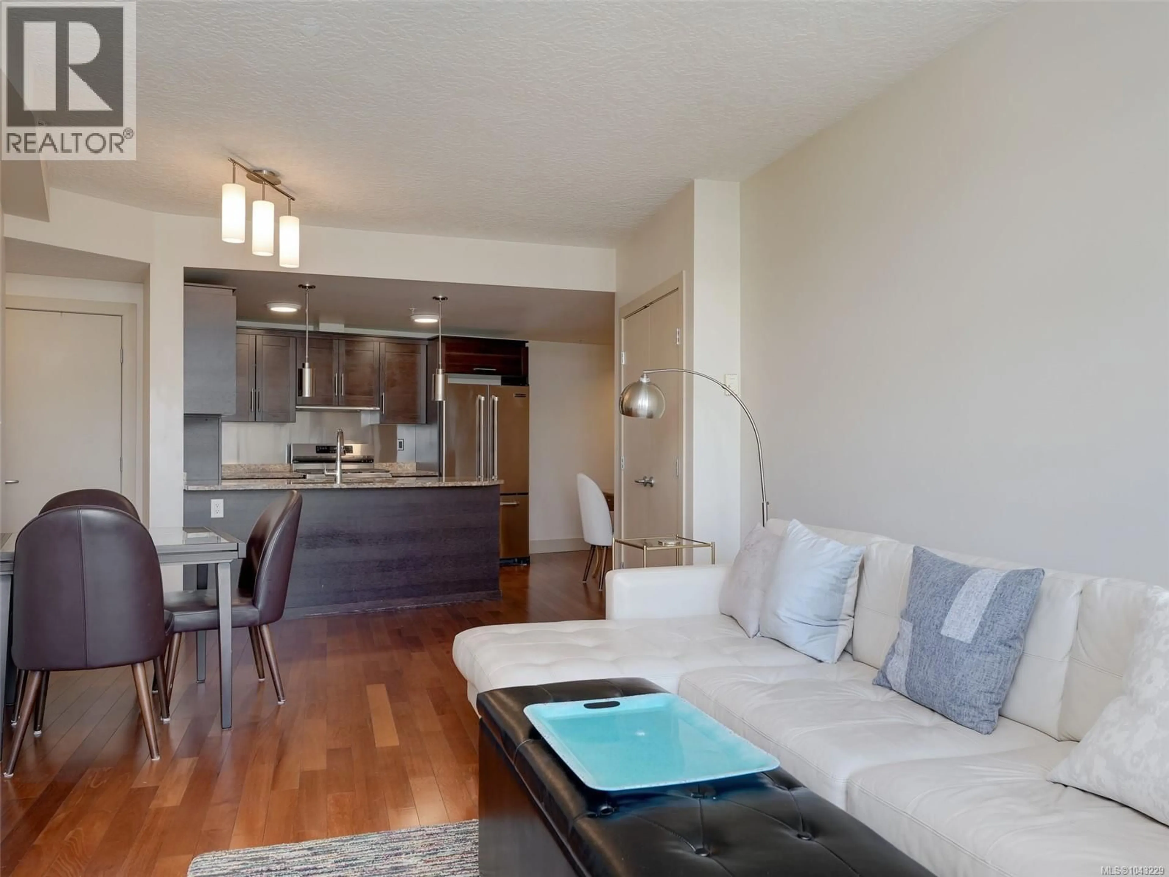 Living room with furniture, wood/laminate floor for S409 - 737 HUMBOLDT STREET, Victoria British Columbia V8W1B1