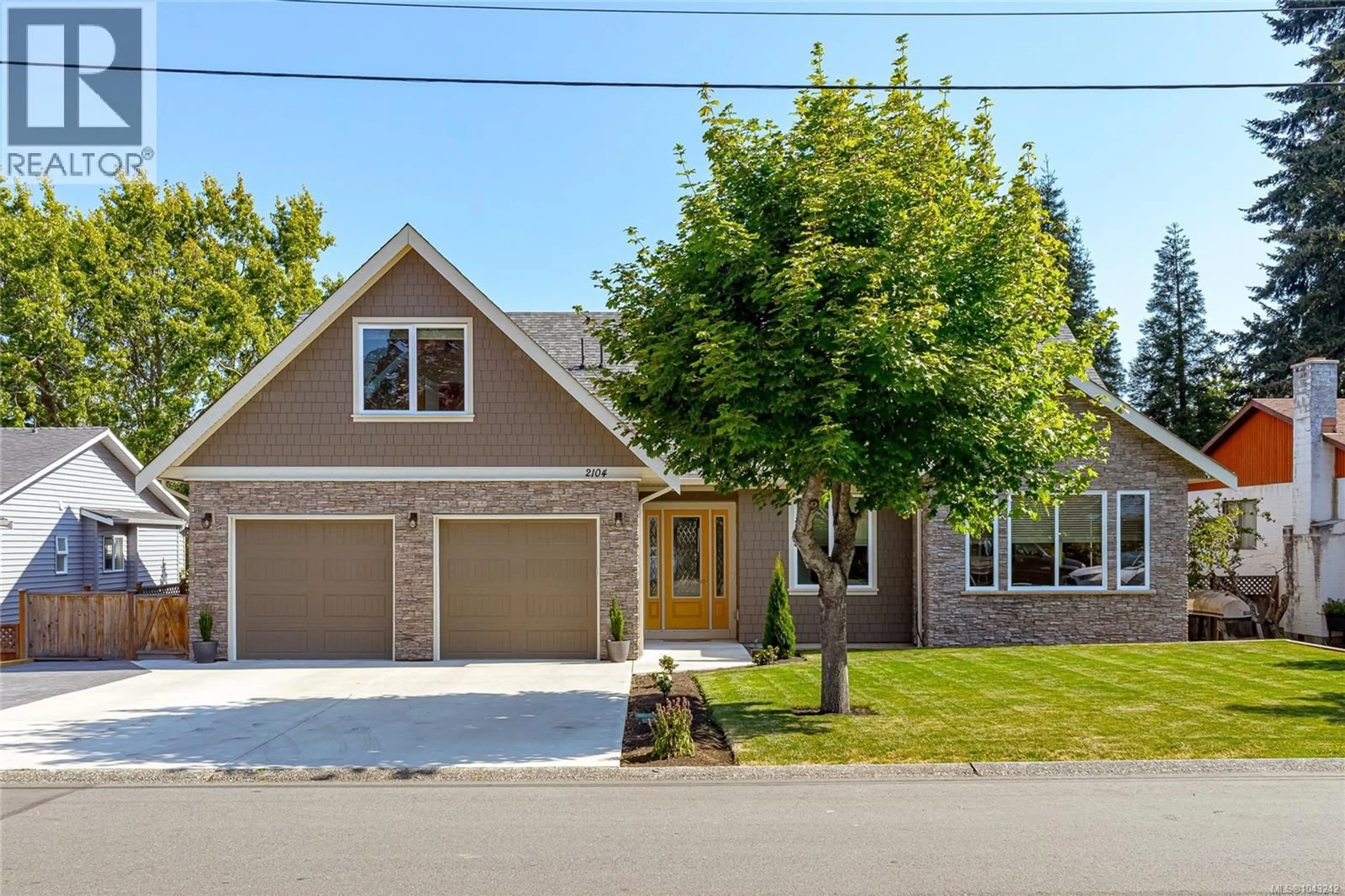 Home with brick exterior material, street for 2104 COLINWOOD ROAD, Sidney British Columbia V8L4H5