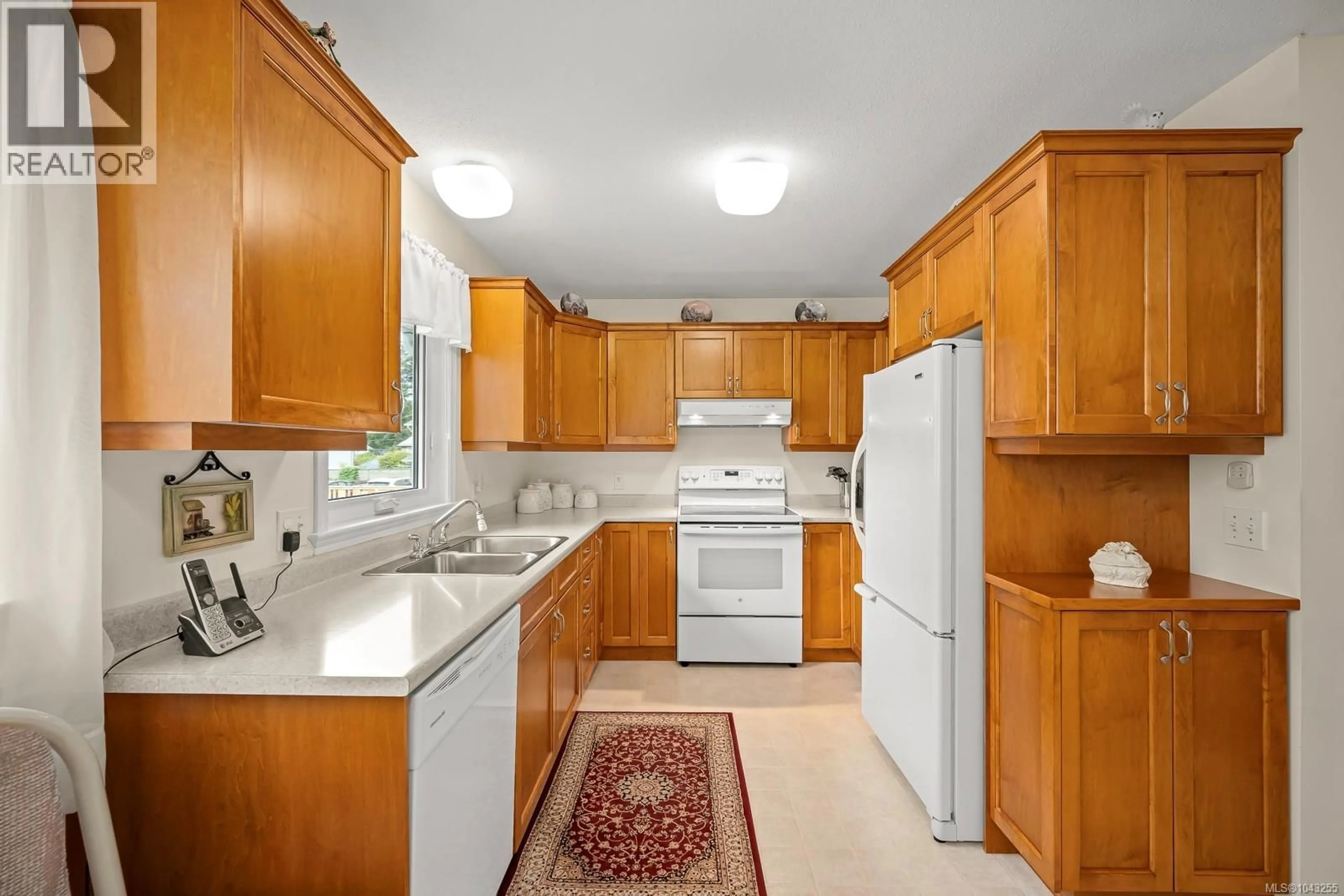 Standard kitchen, ceramic/tile floor for 1413 CANSO AVENUE, Comox British Columbia V9M3C3