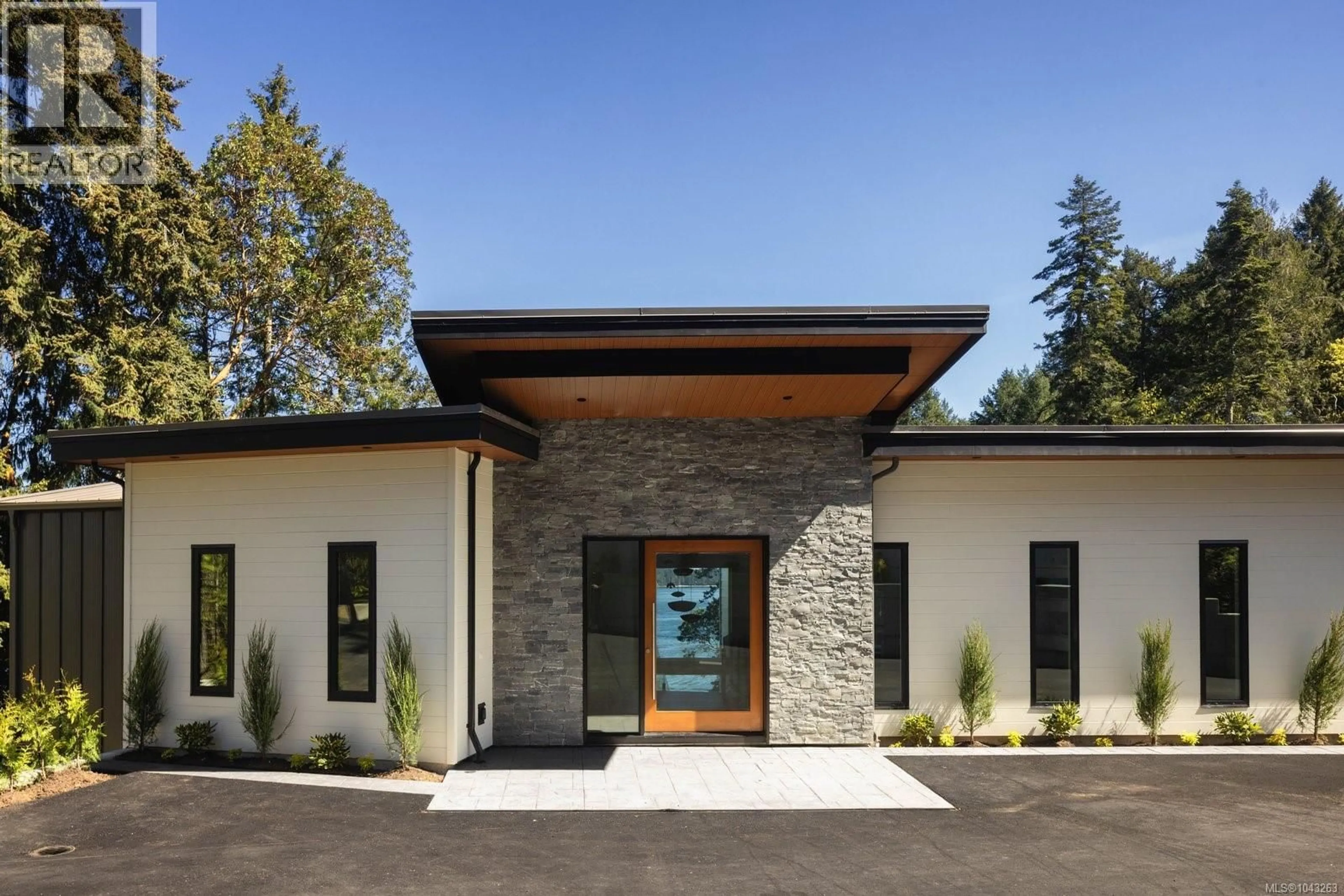 Home with brick exterior material, unknown for 1677 LANDS END ROAD, North Saanich British Columbia V8L5L5