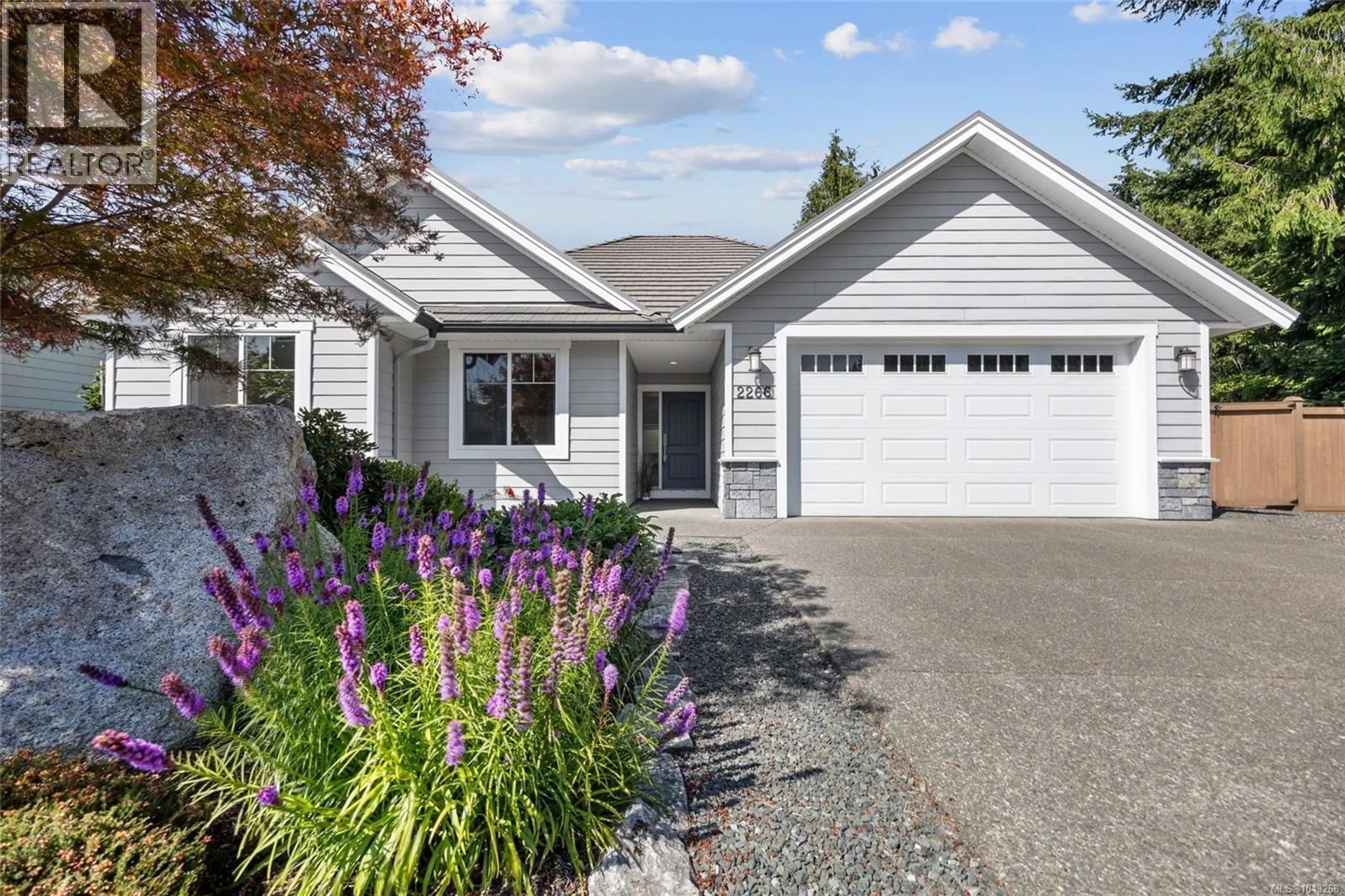 Home with vinyl exterior material, street for 2266 IDIENS WAY, Courtenay British Columbia V9N3Z4