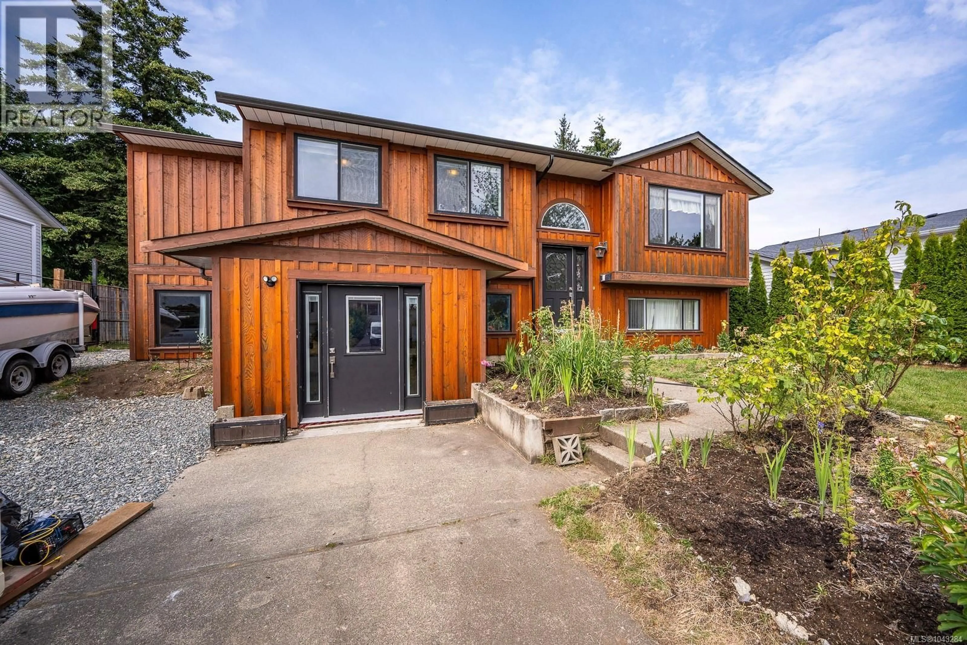 Home with brick exterior material, street for 2110 MURRELET DRIVE, Comox British Columbia V9M3P5