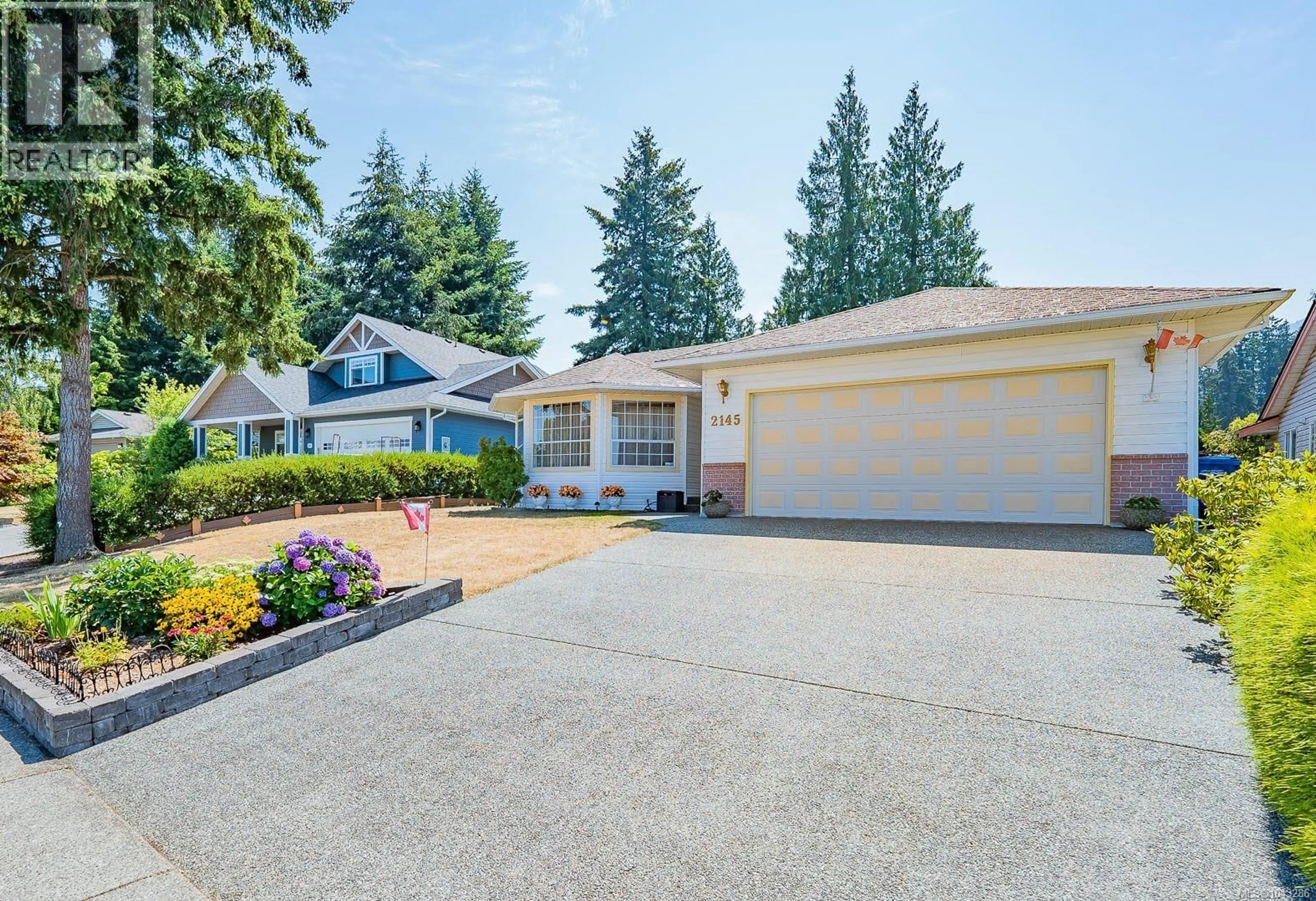 Home with vinyl exterior material, street for 2145 MICHIGAN WAY, Nanaimo British Columbia V9R5K3