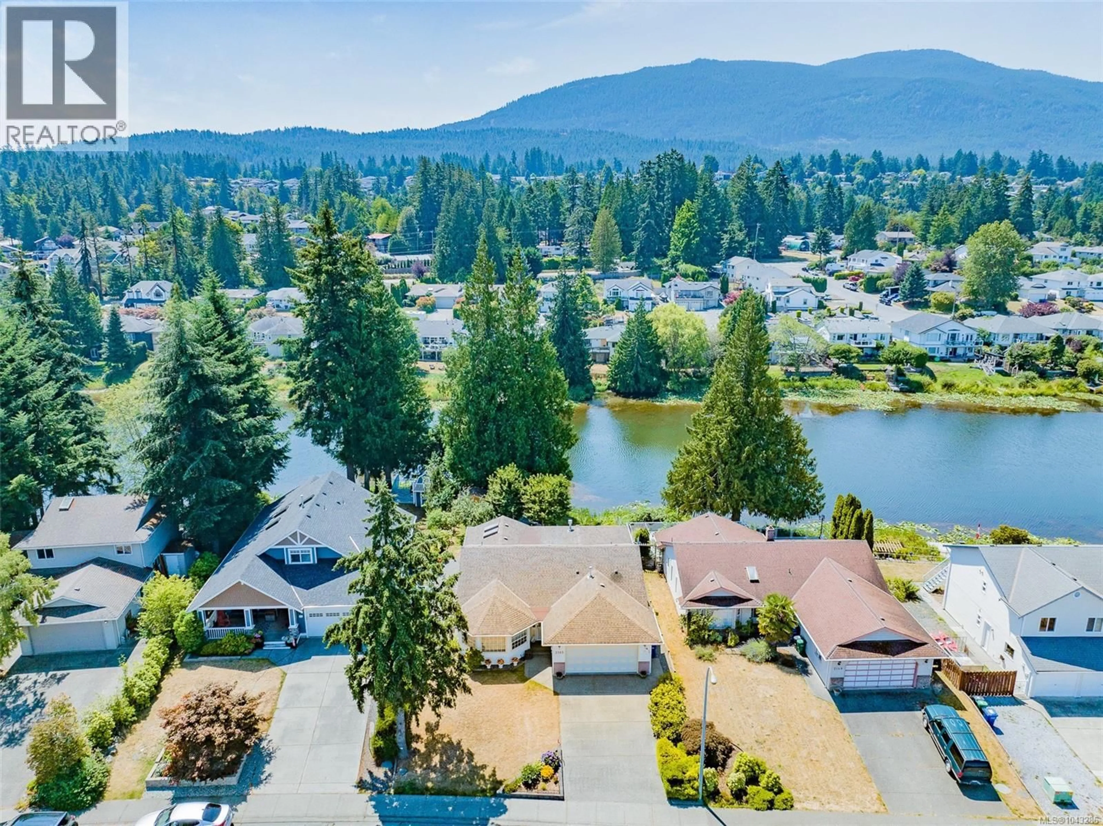 A pic from outside/outdoor area/front of a property/back of a property/a pic from drone, water/lake/river/ocean view for 2145 MICHIGAN WAY, Nanaimo British Columbia V9R5K3