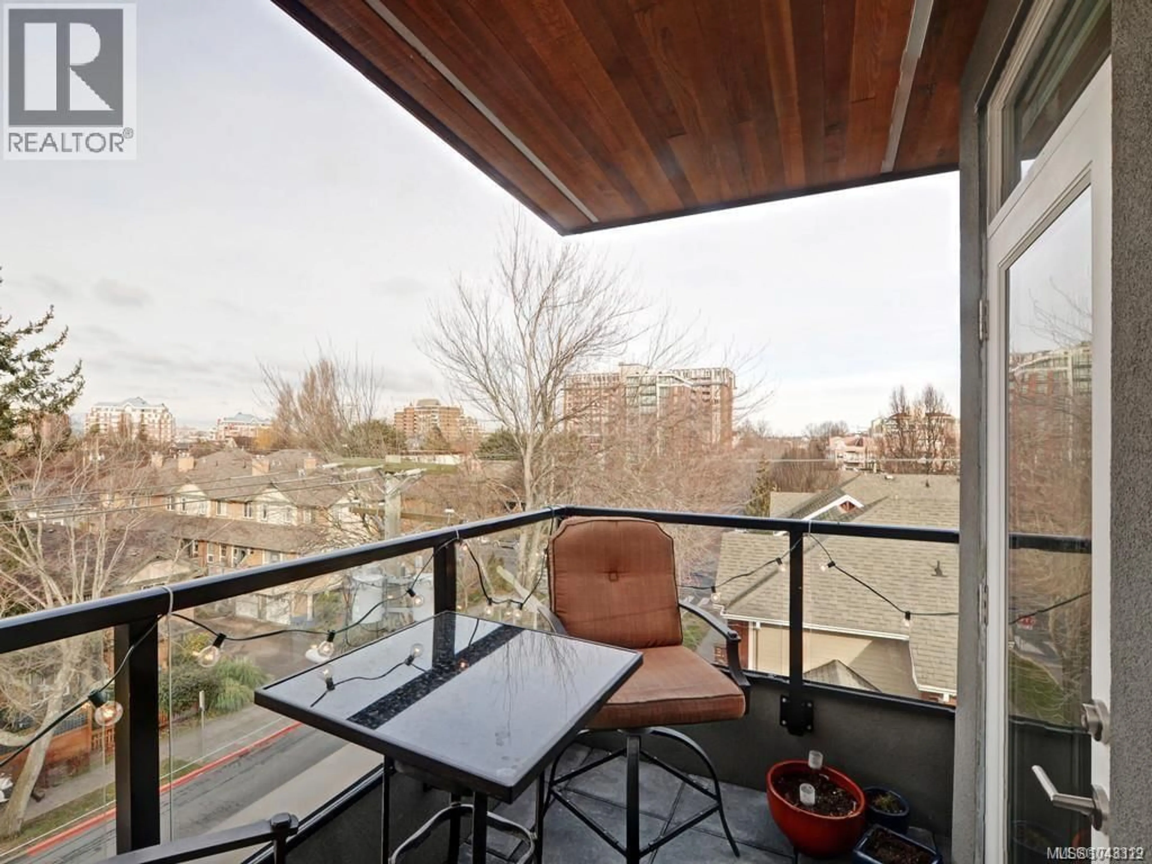 Balcony in the apartment, city buildings view from balcony for 403 - 300 MICHIGAN STREET, Victoria British Columbia V8V1R5