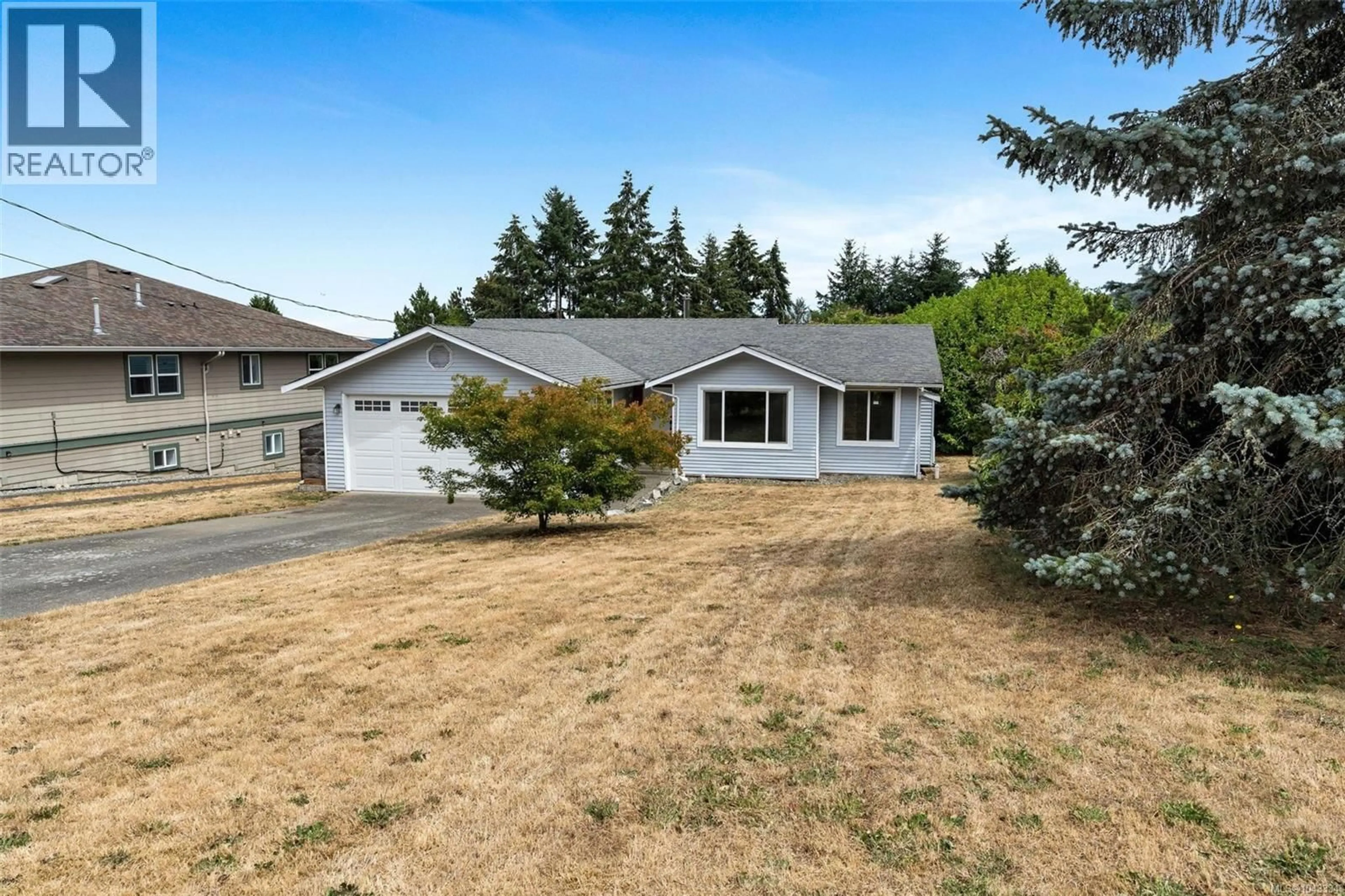 Home with vinyl exterior material, street for 2473 BIDSTON ROAD, Mill Bay British Columbia V0R2P4