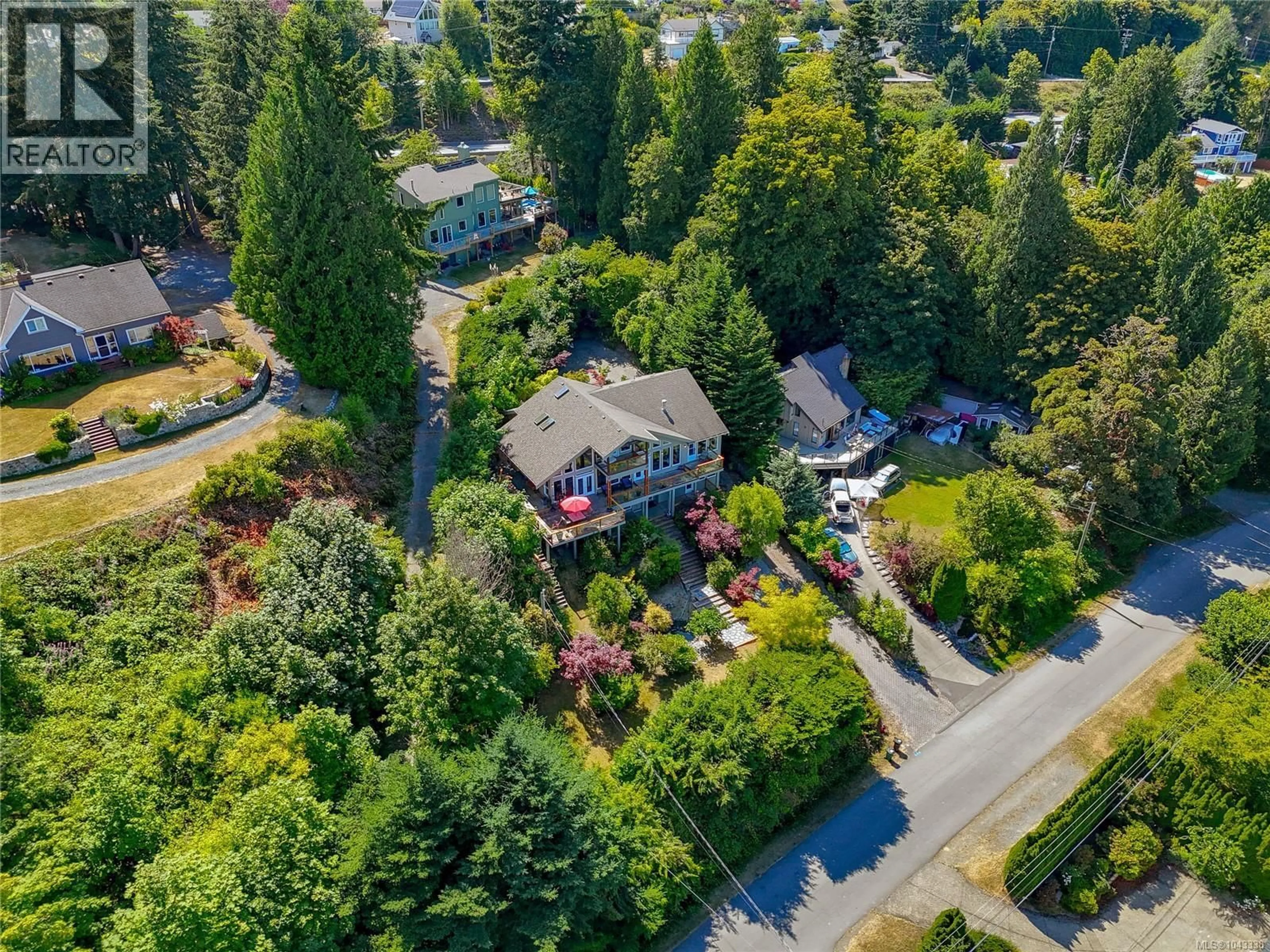 A pic from outside/outdoor area/front of a property/back of a property/a pic from drone, street for 2550 SEAVIEW ROAD, Mill Bay British Columbia V8H1C8