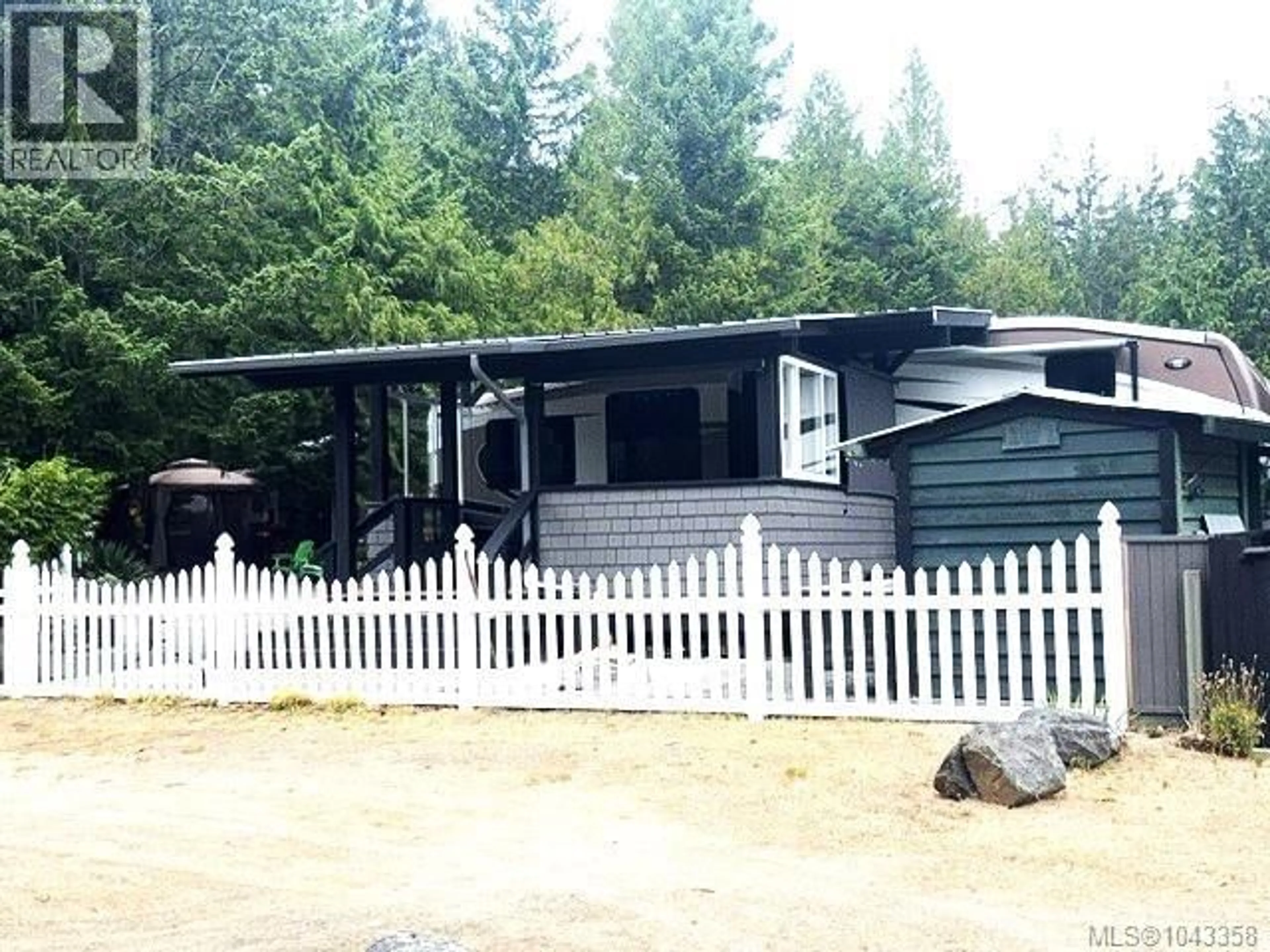 Home with vinyl exterior material, street for A4 - 2650 TURNBULL ROAD, Qualicum Beach British Columbia V0R1G0