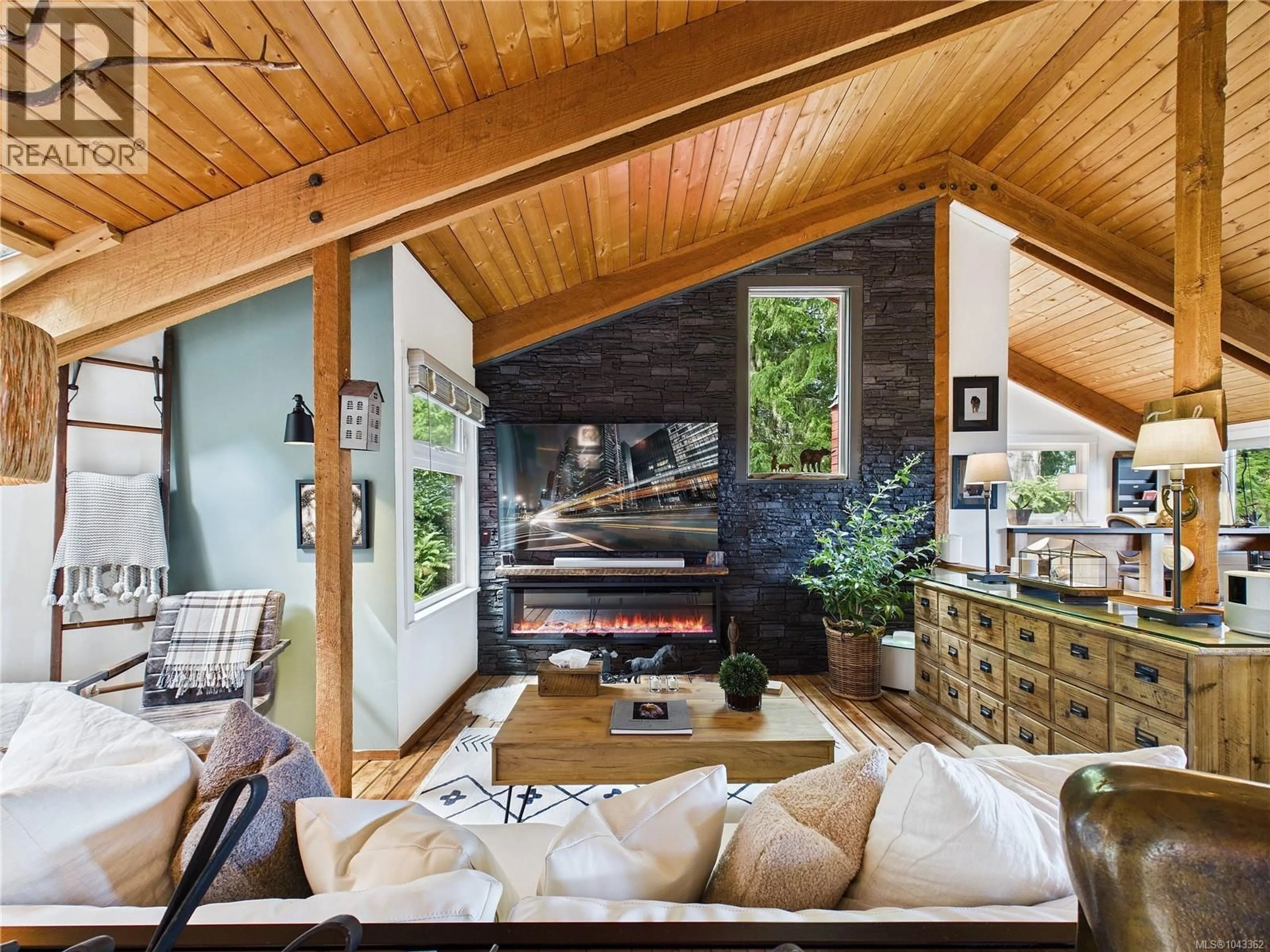 Living room with furniture, wood/laminate floor for 182 DEVINE DRIVE, Salt Spring British Columbia V8K2H5