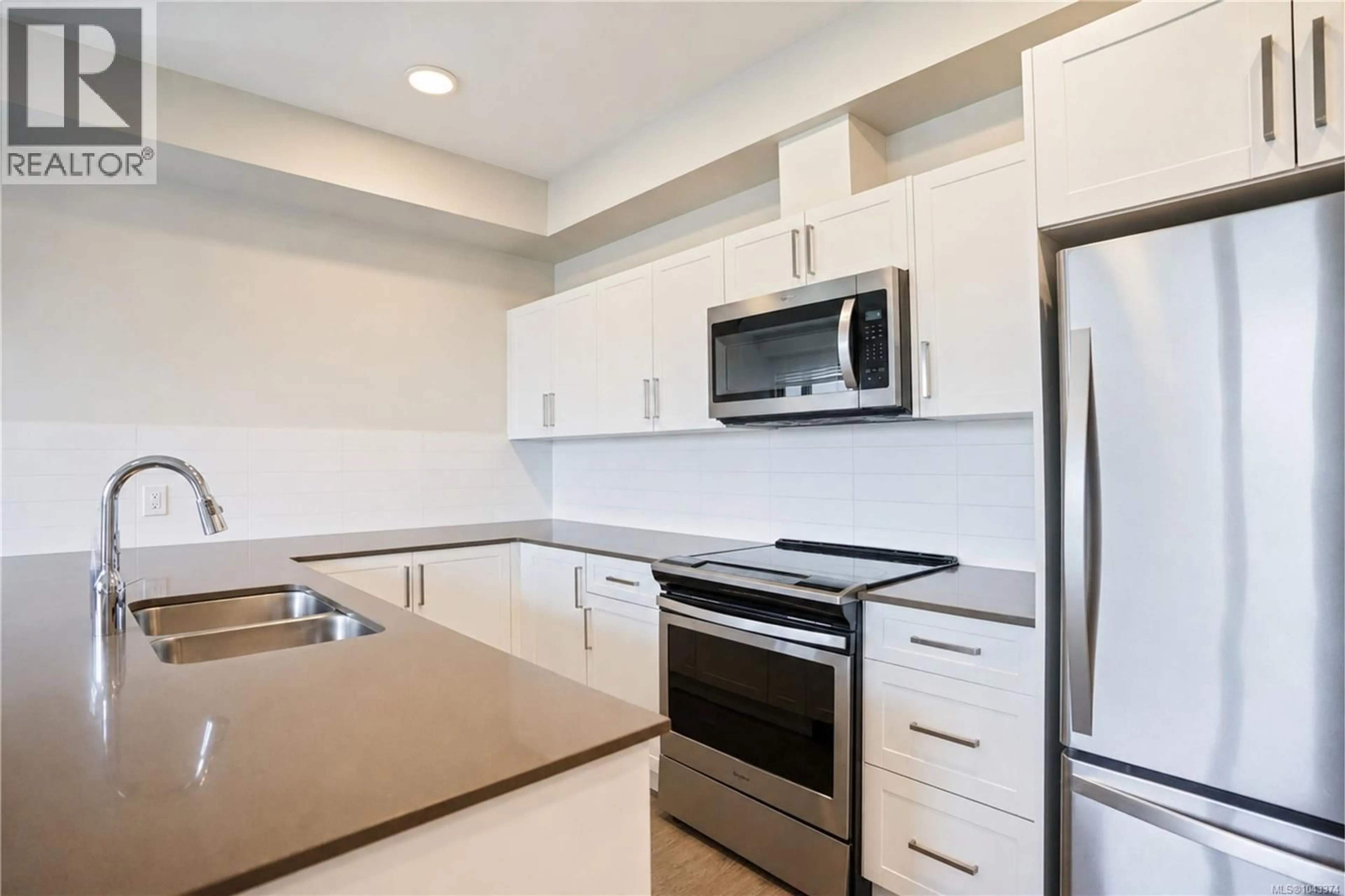 Standard kitchen, ceramic/tile floor for 608 - 2843 JACKLIN ROAD, Langford British Columbia V9B4P4
