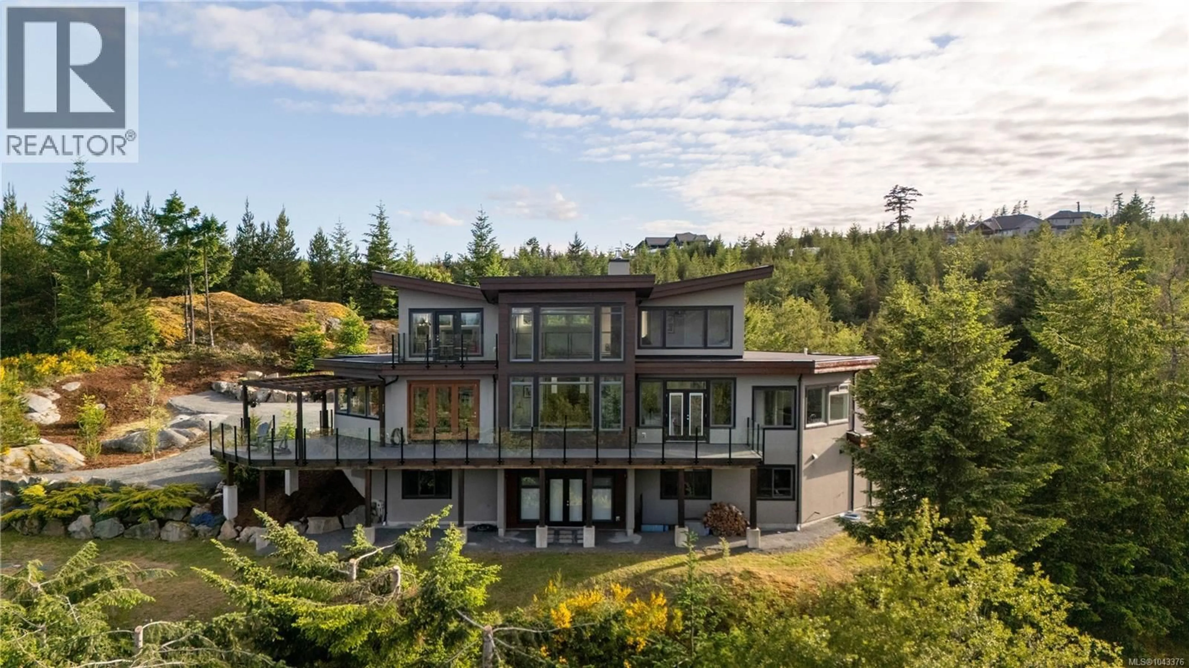 A pic from outside/outdoor area/front of a property/back of a property/a pic from drone, water/lake/river/ocean view for 1150 STONECREST WAY, Shawnigan Lake British Columbia V8H2J1