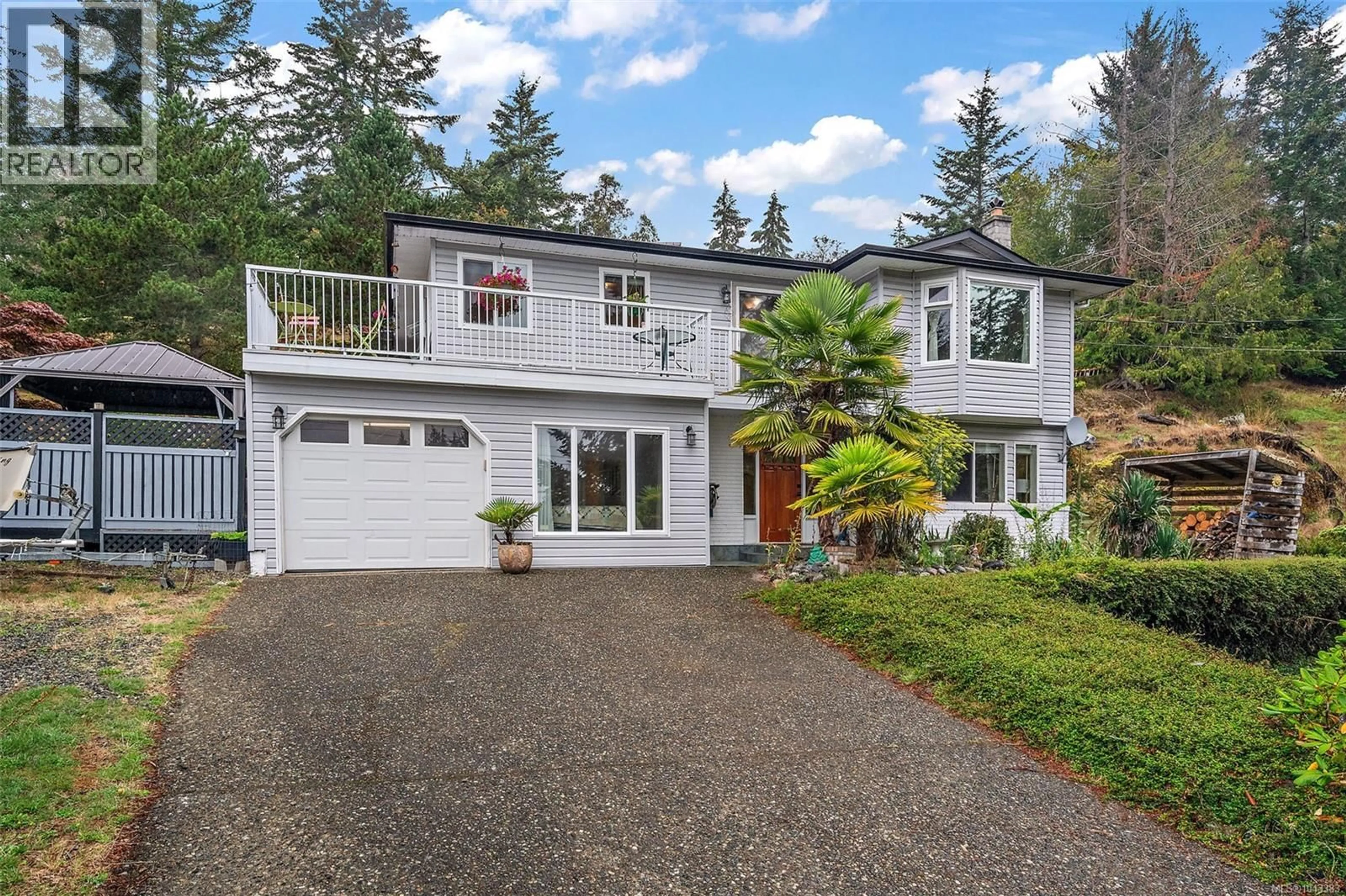 Home with vinyl exterior material, street for 2197 HENLYN DRIVE, Sooke British Columbia V9Z0N5
