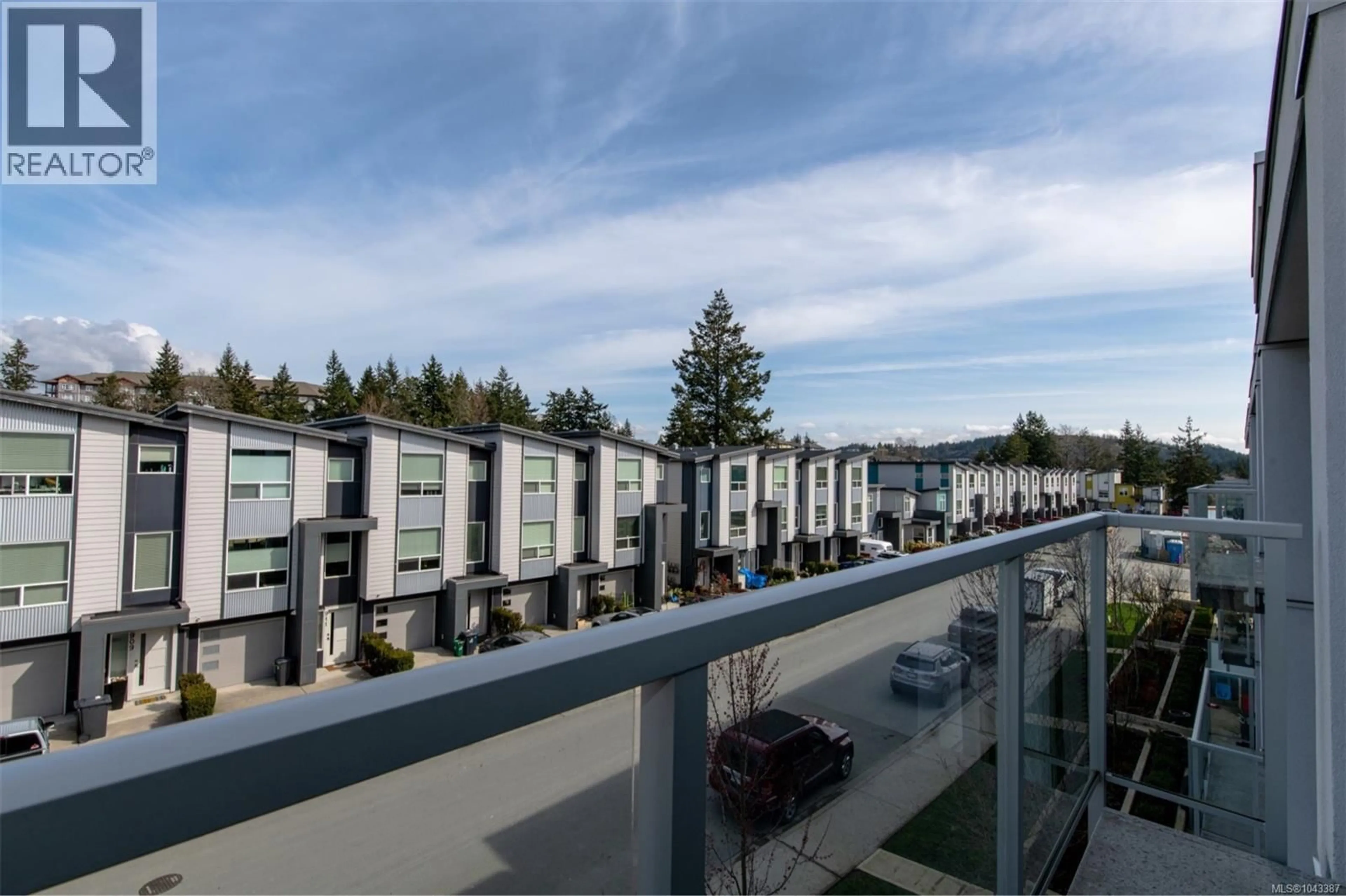 Balcony in the apartment, city buildings view from balcony for 318 - 950 WHIRLAWAY CRESCENT, Langford British Columbia V9B0Y3