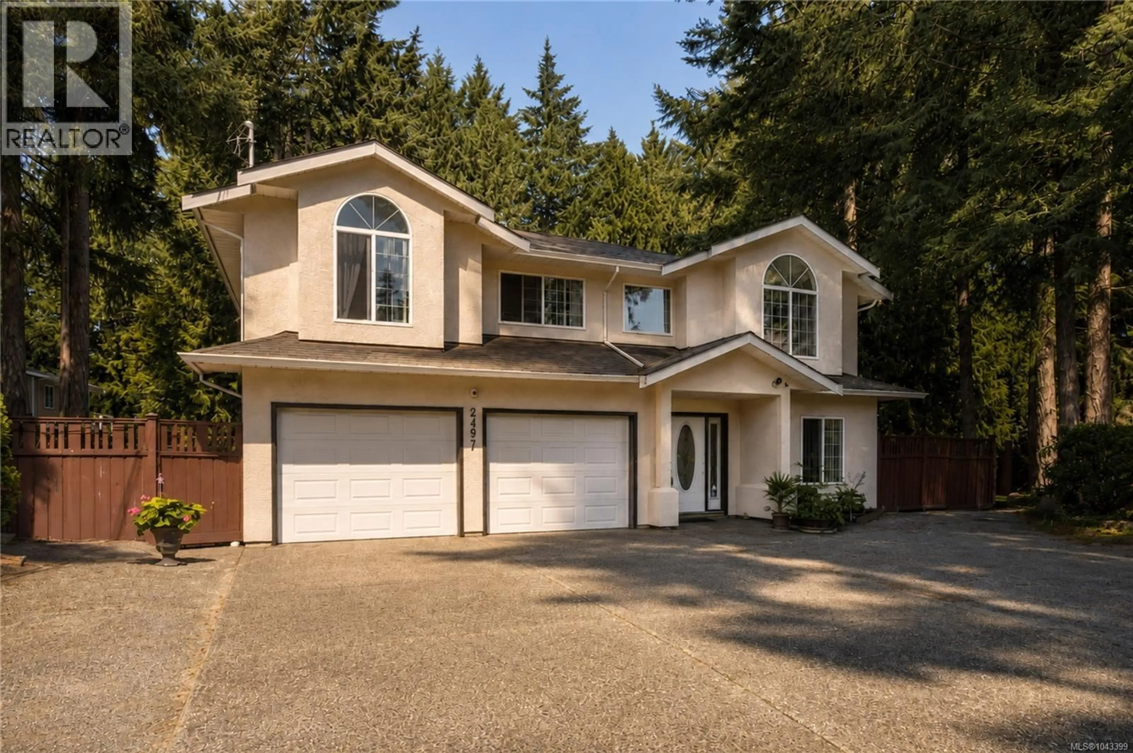 Home with vinyl exterior material, street for 2497 CAYMAN PLACE, Mill Bay British Columbia V0R2P1