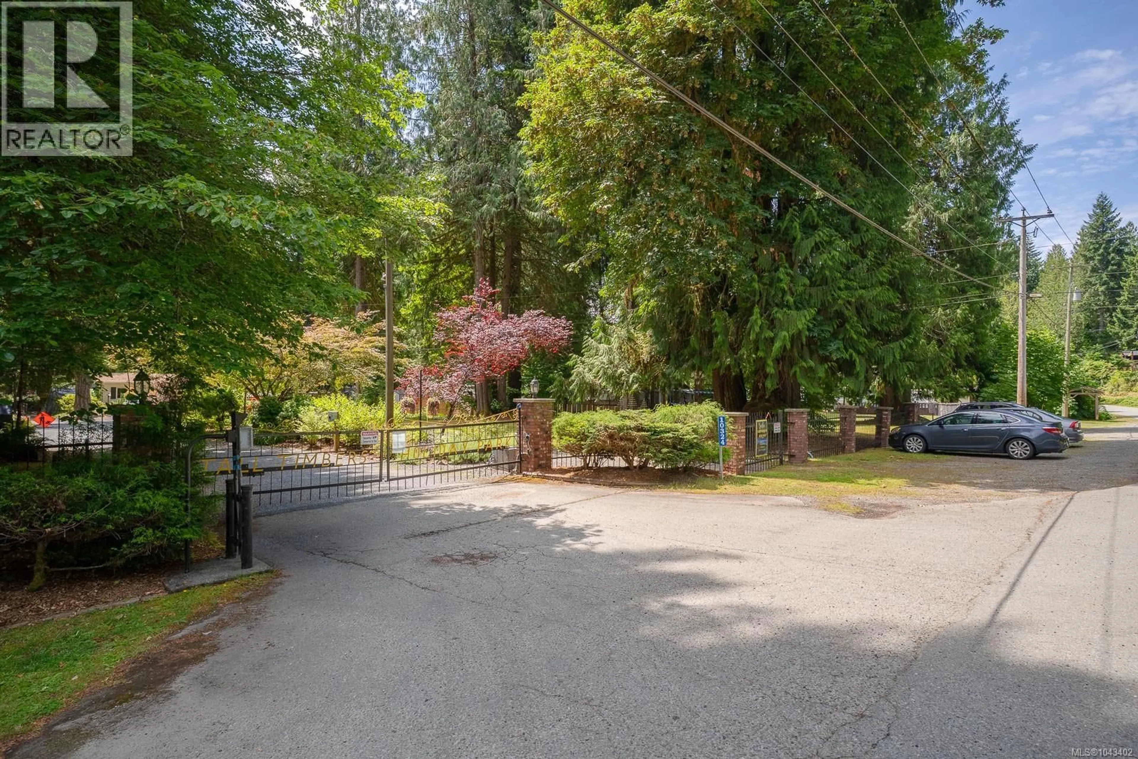 A pic from outside/outdoor area/front of a property/back of a property/a pic from drone, street for 10324 LAKESHORE ROAD, Port Alberni British Columbia V9Y8Z6