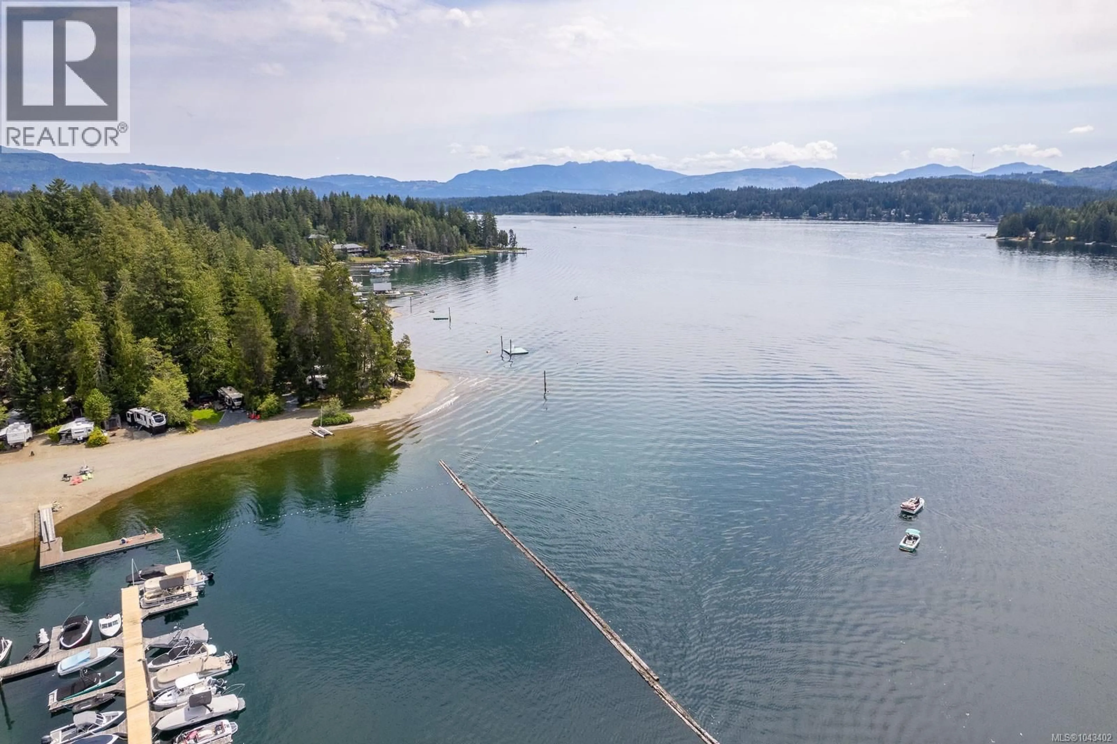 A pic from outside/outdoor area/front of a property/back of a property/a pic from drone, water/lake/river/ocean view for 10324 LAKESHORE ROAD, Port Alberni British Columbia V9Y8Z6
