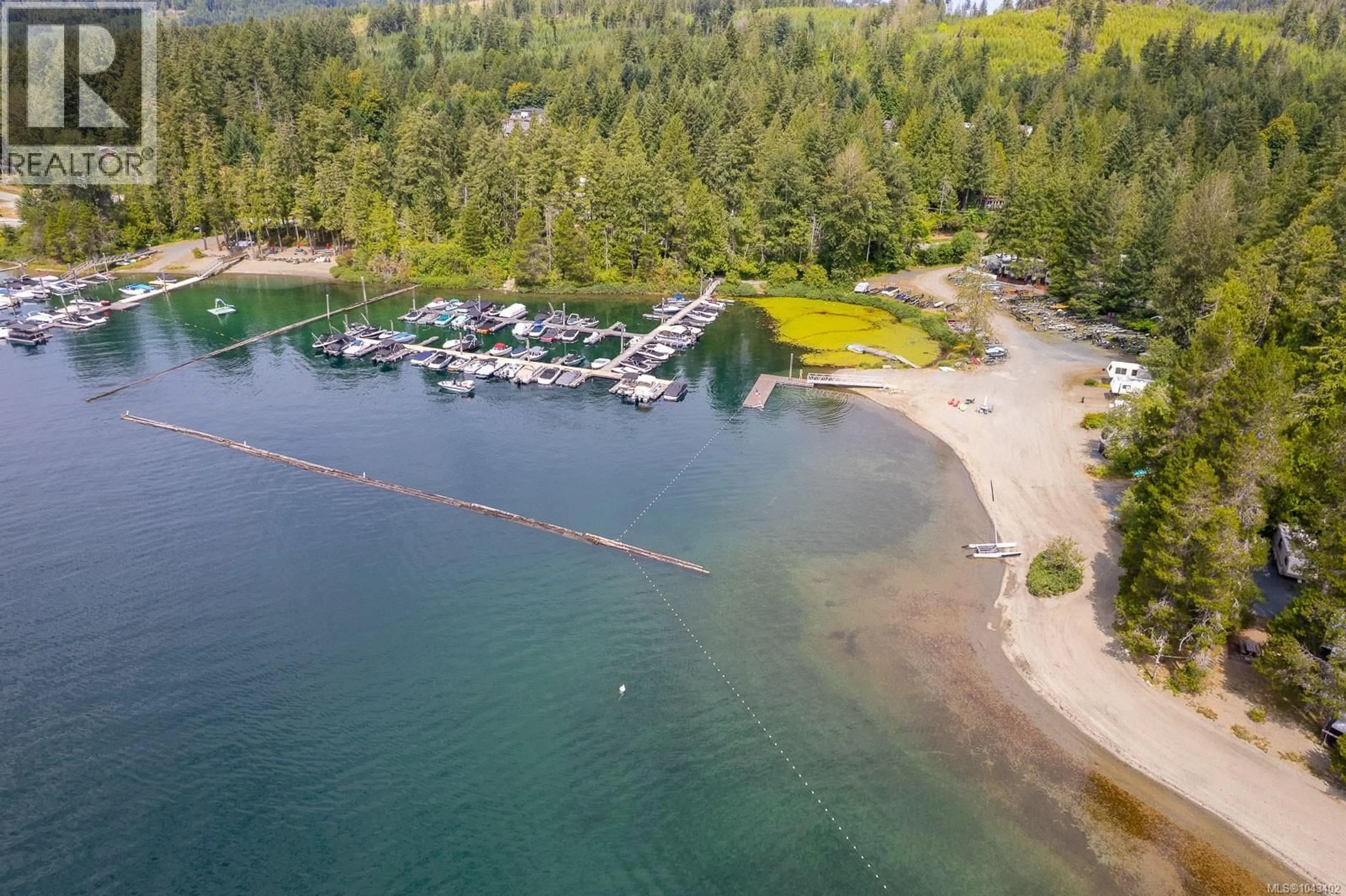 A pic from outside/outdoor area/front of a property/back of a property/a pic from drone, water/lake/river/ocean view for 10324 LAKESHORE ROAD, Port Alberni British Columbia V9Y8Z6