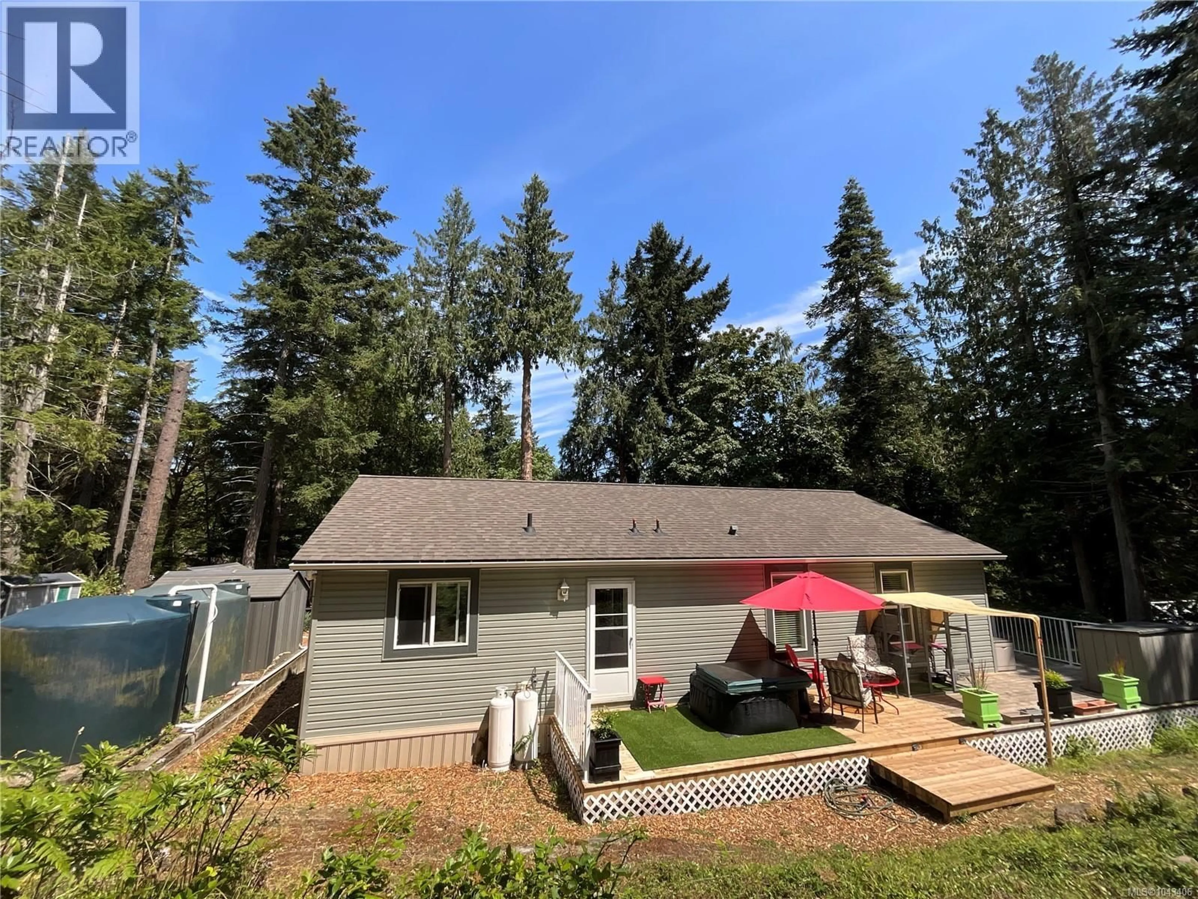 A pic from outside/outdoor area/front of a property/back of a property/a pic from drone, forest/trees view for 157 EASTHOM ROAD, Gabriola Island British Columbia V0R1X2