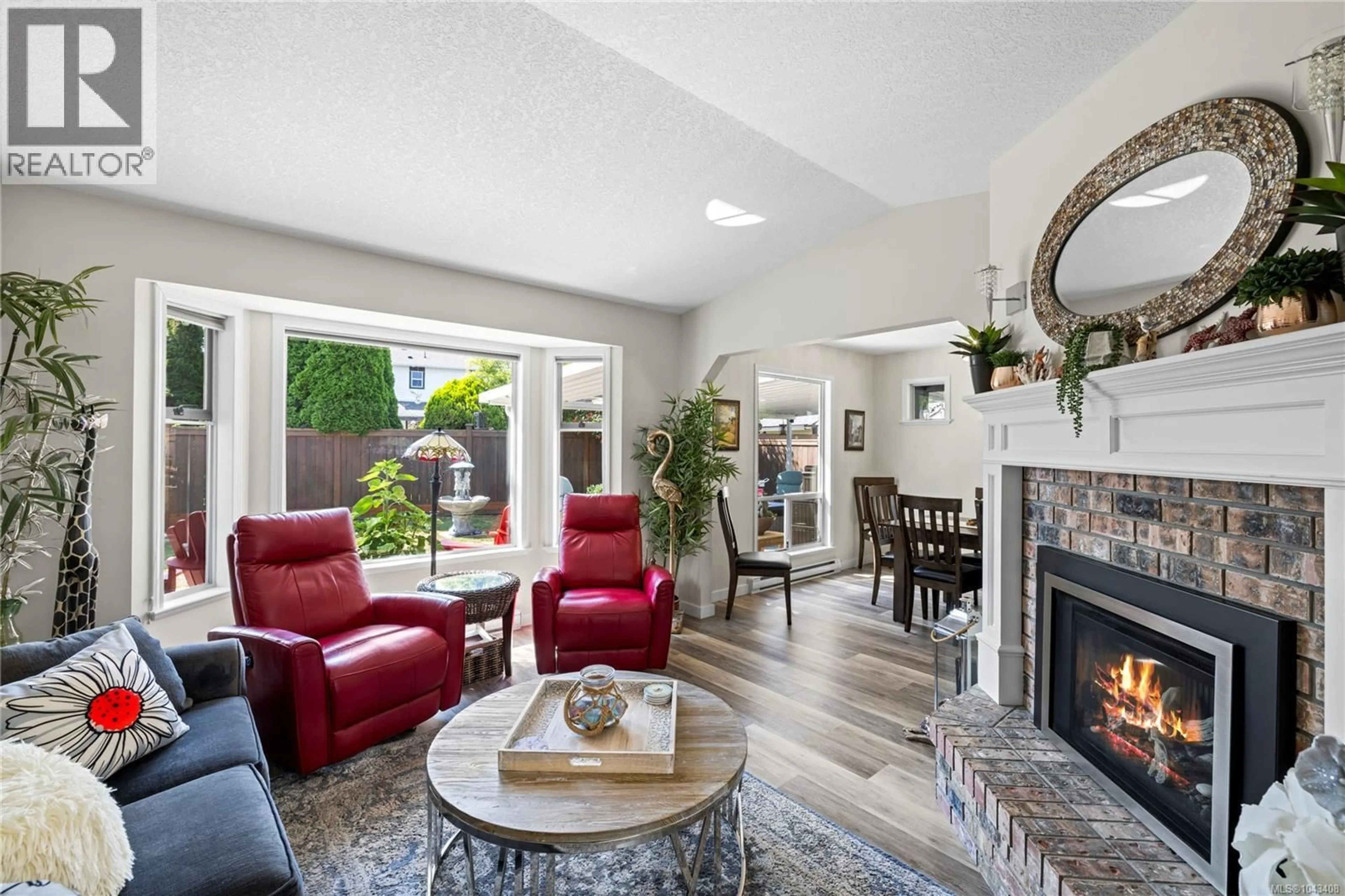 Living room with furniture, ceramic/tile floor for 1332 CHESTERTON PLACE, French Creek British Columbia V9P1W9