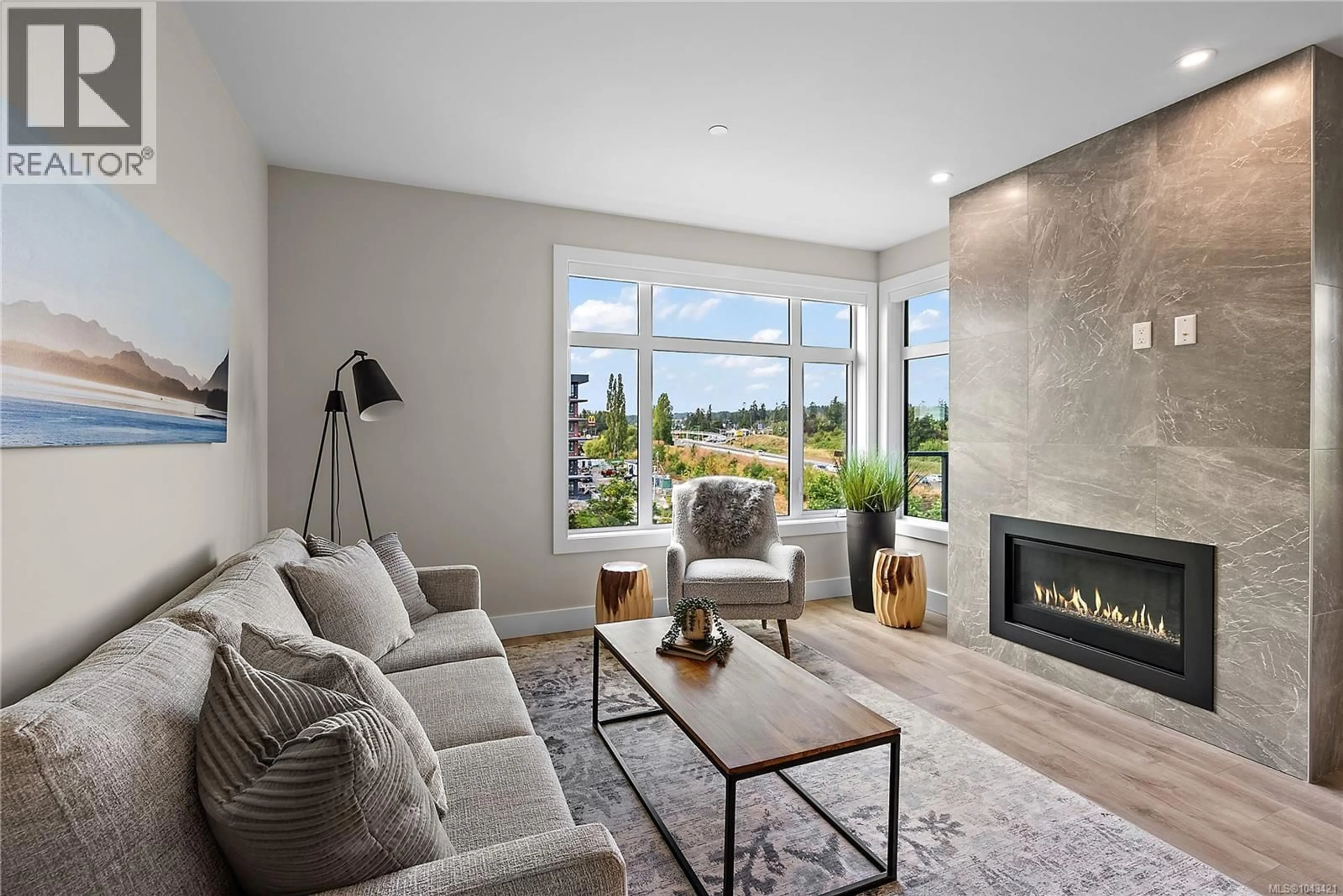 Living room with furniture, unknown for 202 - 2520 HACKETT CRESCENT, Central Saanich British Columbia V8M0C5