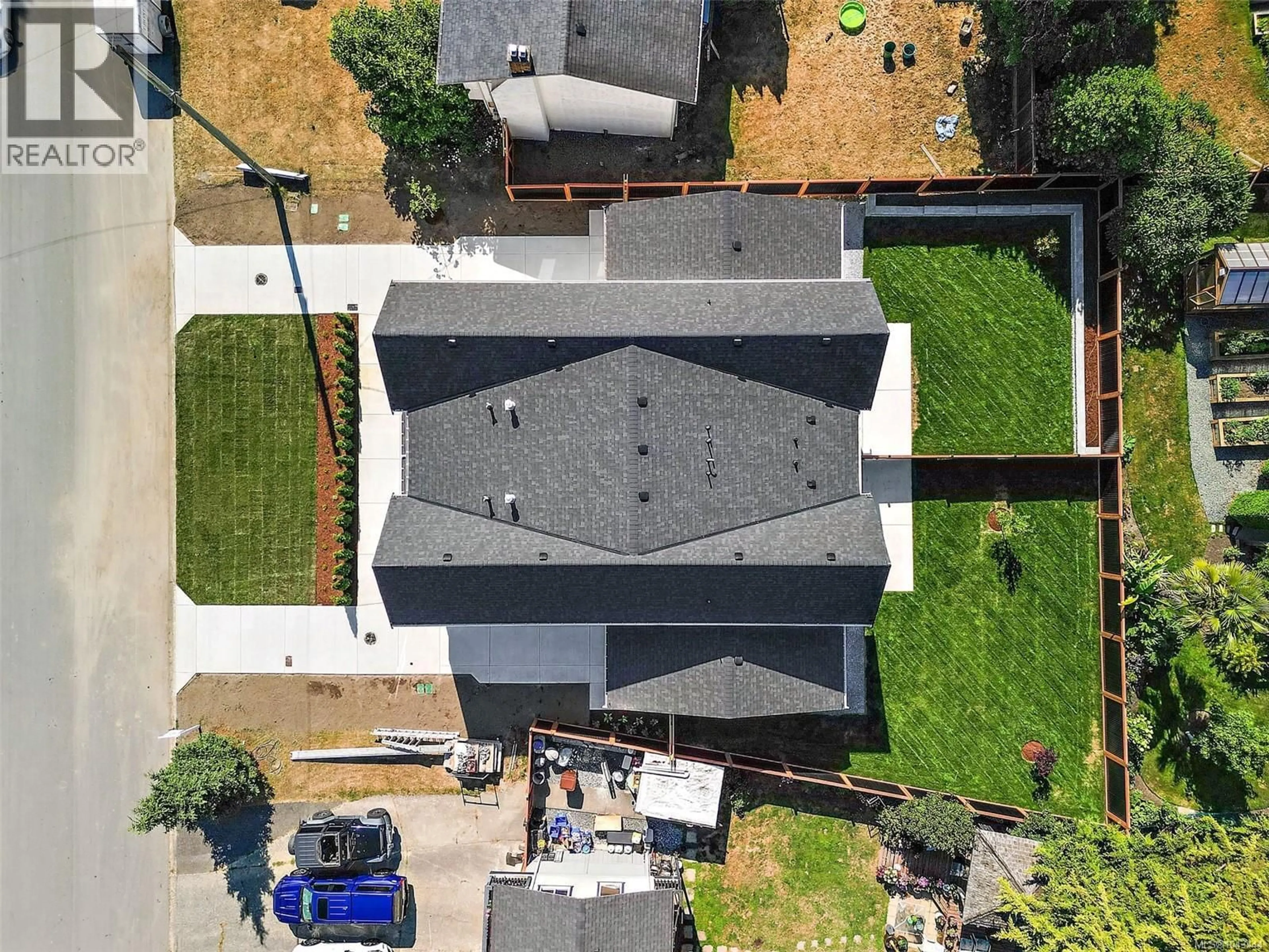 A pic from outside/outdoor area/front of a property/back of a property/a pic from drone, street for 102 - 1870 DONEY ROAD, Central Saanich British Columbia V8M1K6