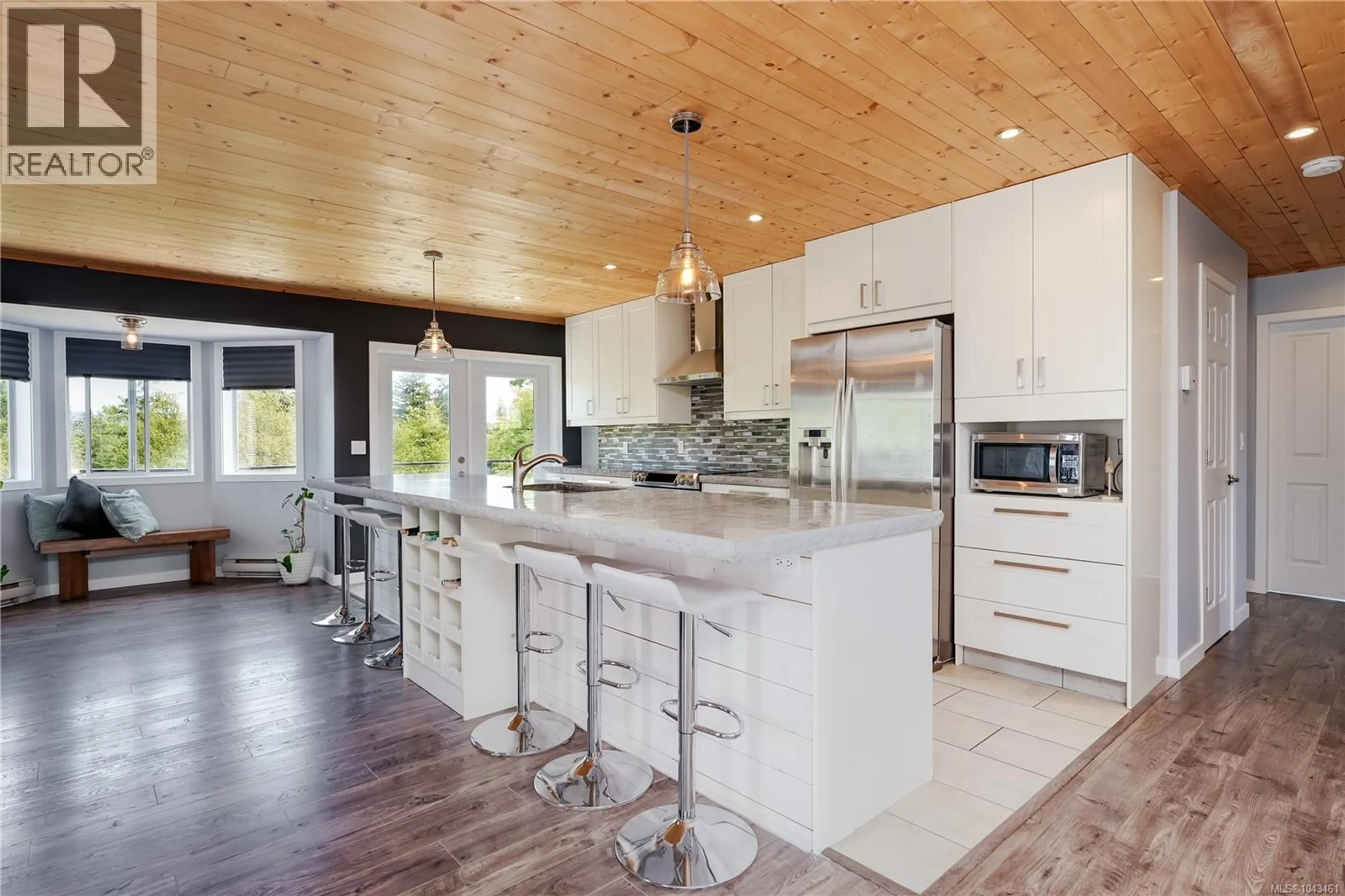Open concept kitchen, wood/laminate floor for 2103 AMETHYST WAY, Sooke British Columbia V9Z0M2