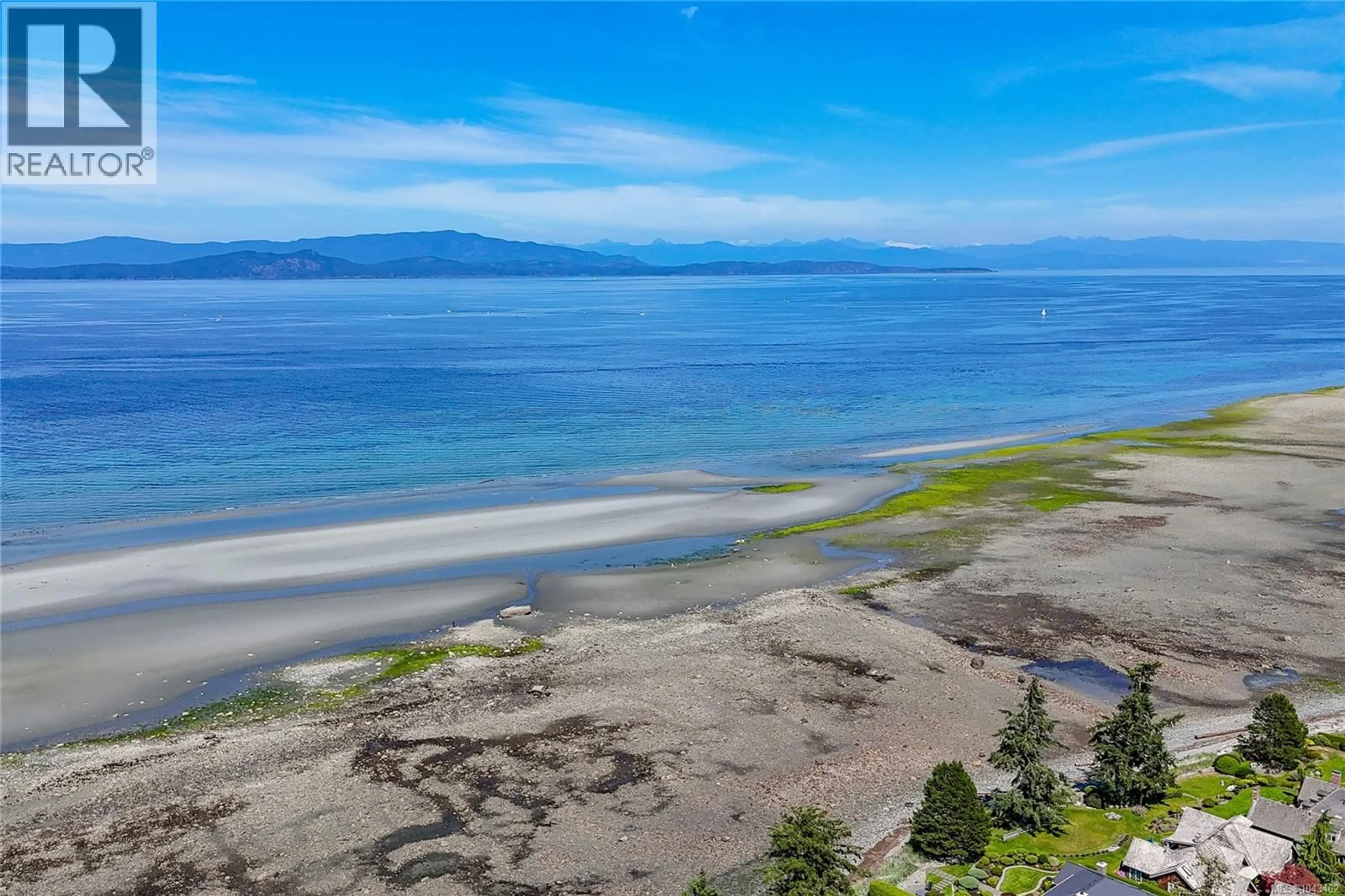 A pic from outside/outdoor area/front of a property/back of a property/a pic from drone, water/lake/river/ocean view for 618 WINDWARD WAY, Qualicum Beach British Columbia V9K2K4