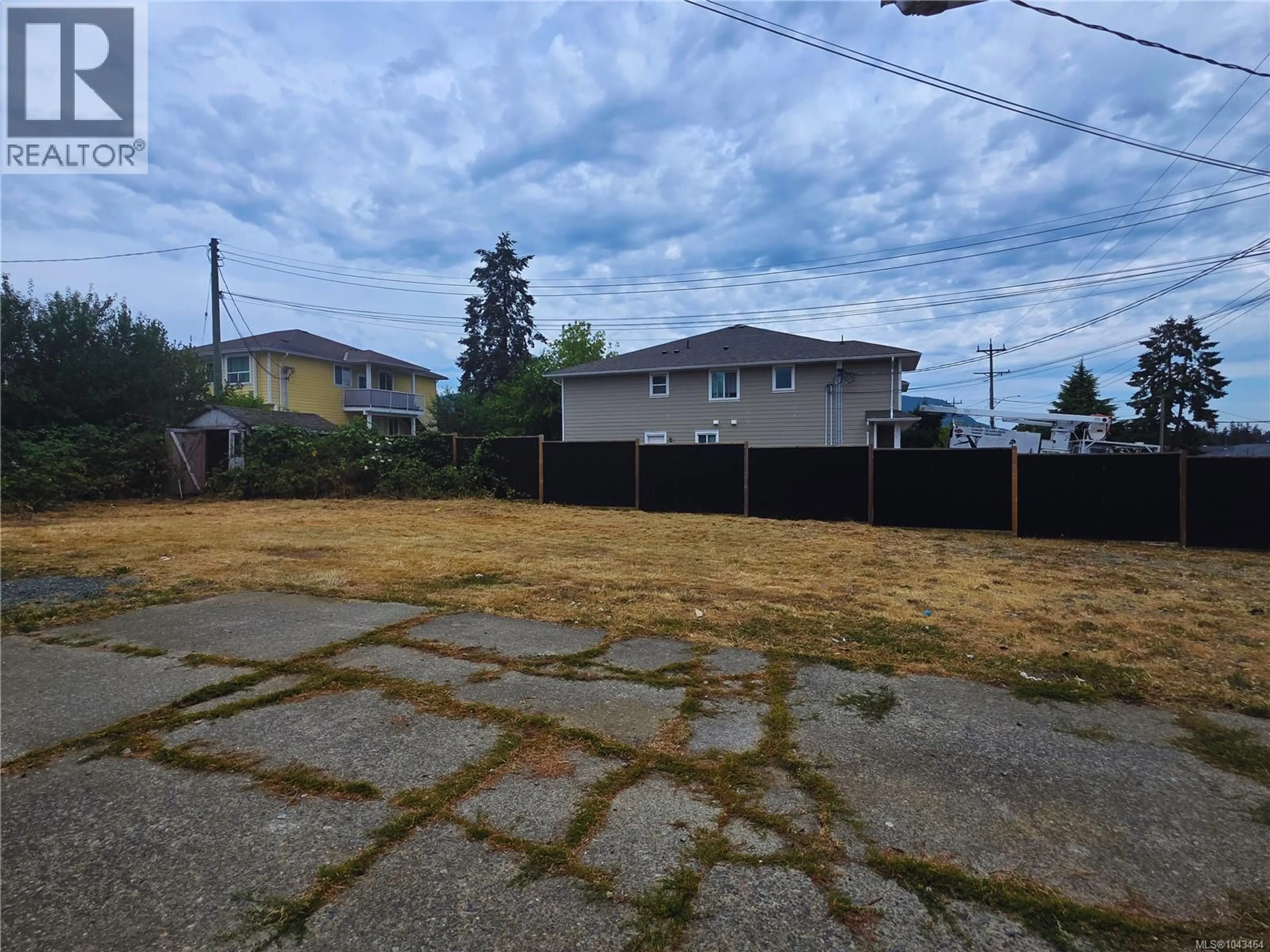 A pic from outside/outdoor area/front of a property/back of a property/a pic from drone, street for 3381 COWICHAN LAKE ROAD, Duncan British Columbia V9L4C5