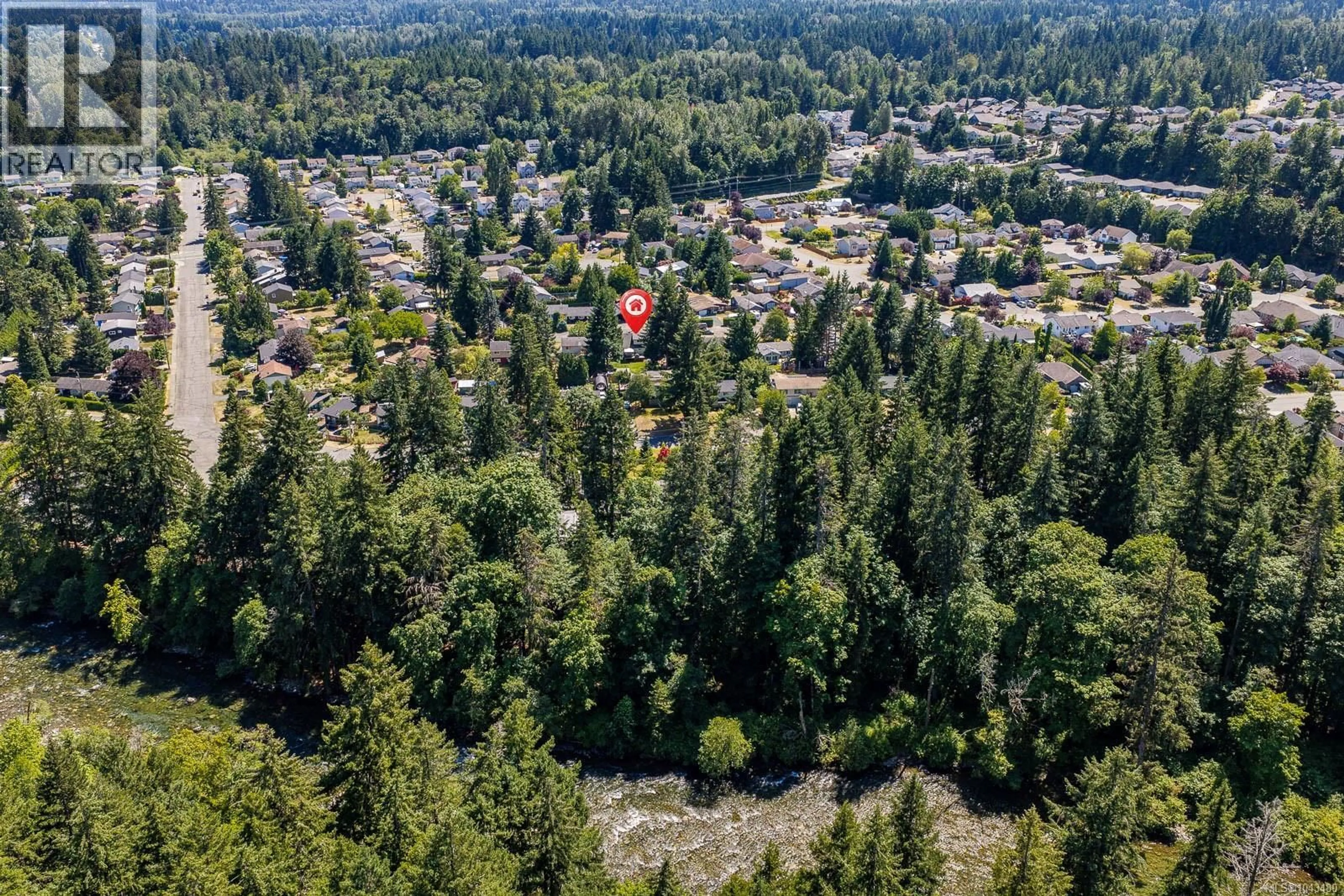 A pic from outside/outdoor area/front of a property/back of a property/a pic from drone, forest/trees view for 58 MITCHELL ROAD, Courtenay British Columbia V9N6C3