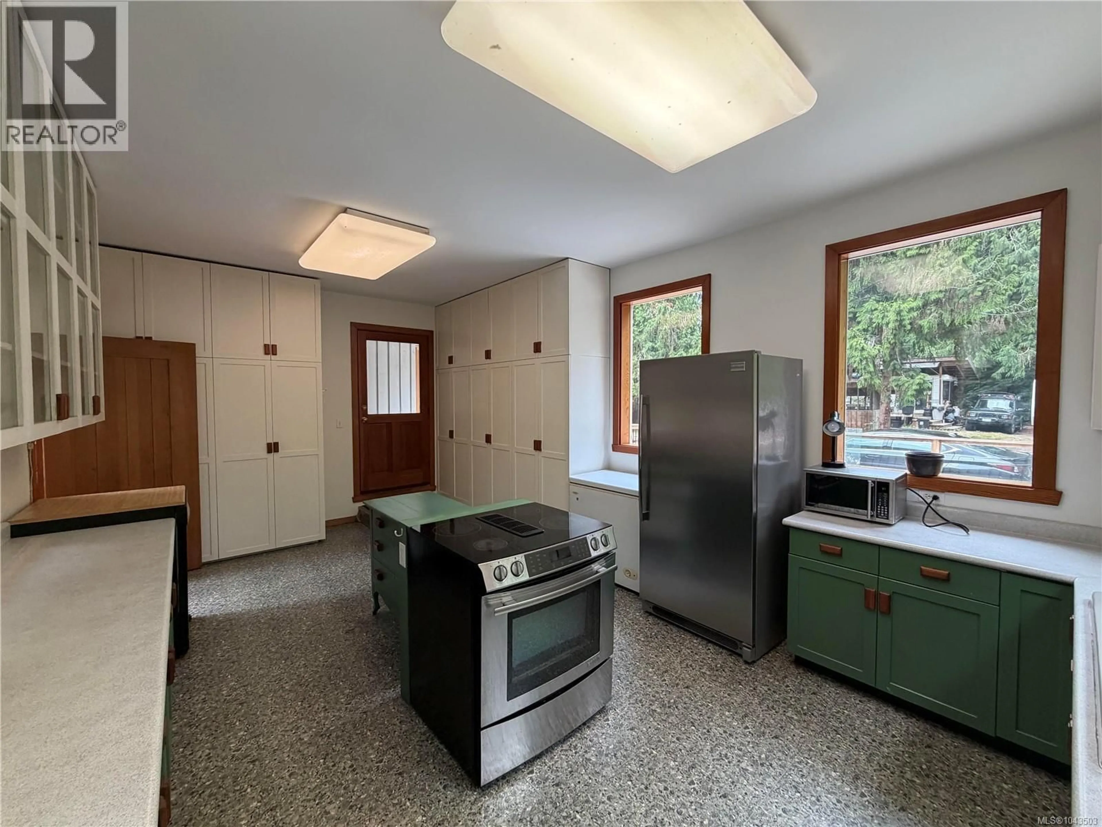 Kitchen with laundary machines, unknown for 380 PARKER ROAD, Qualicum Beach British Columbia V9K1S9