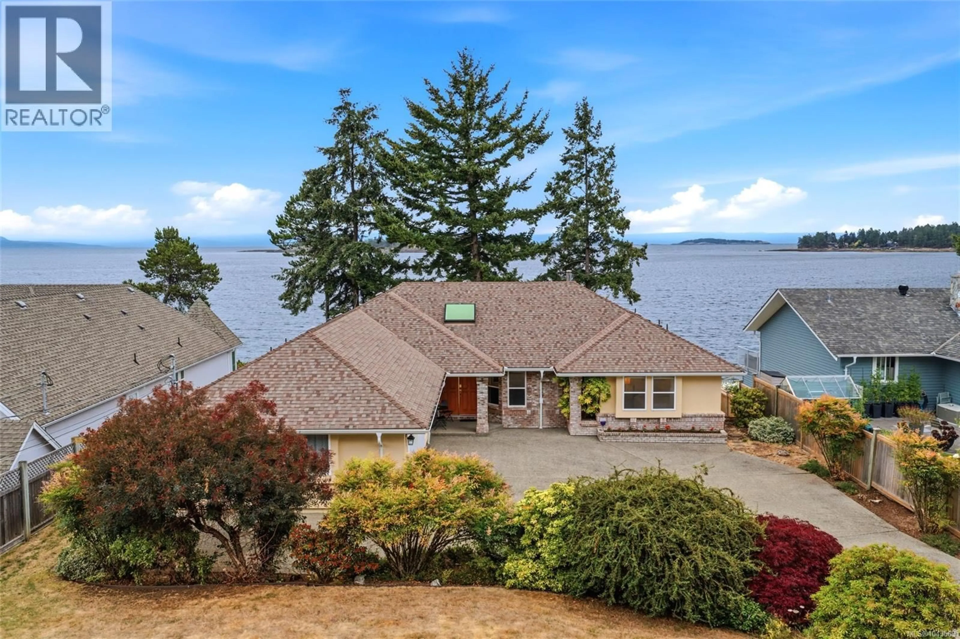 A pic from outside/outdoor area/front of a property/back of a property/a pic from drone, water/lake/river/ocean view for 1432 MADRONA DRIVE, Nanoose Bay British Columbia V9P9C9