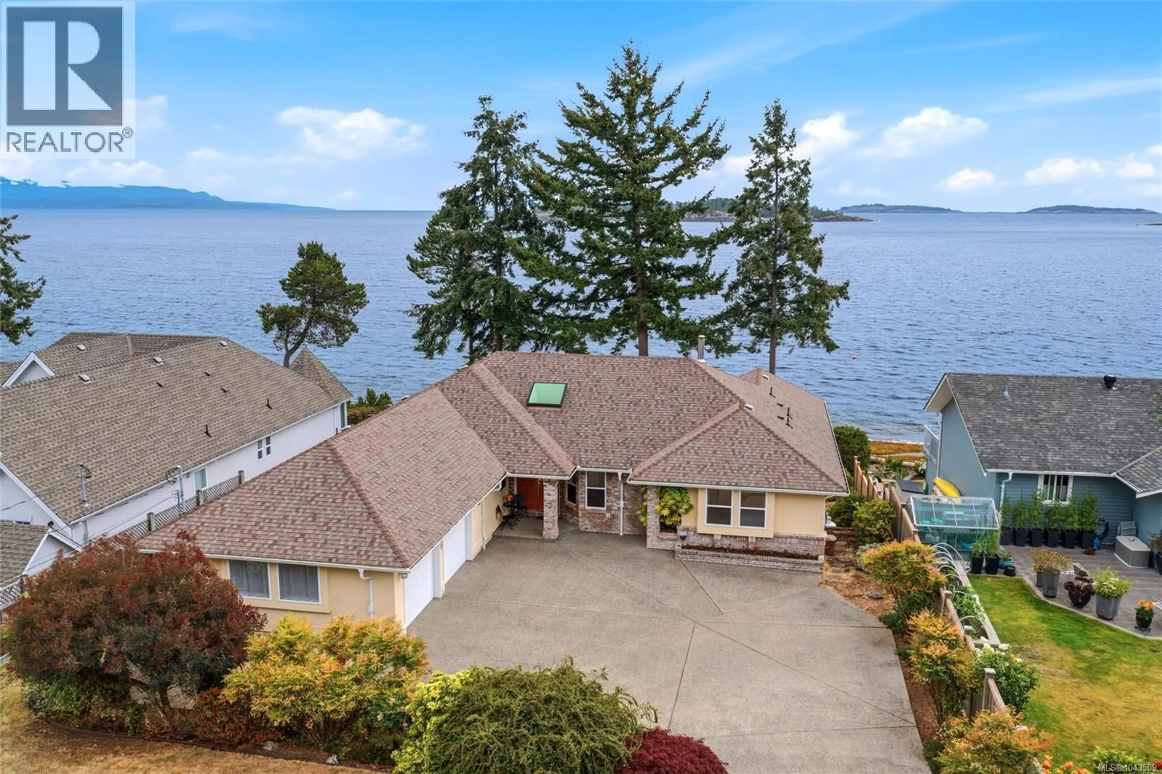 A pic from outside/outdoor area/front of a property/back of a property/a pic from drone, water/lake/river/ocean view for 1432 MADRONA DRIVE, Nanoose Bay British Columbia V9P9C9