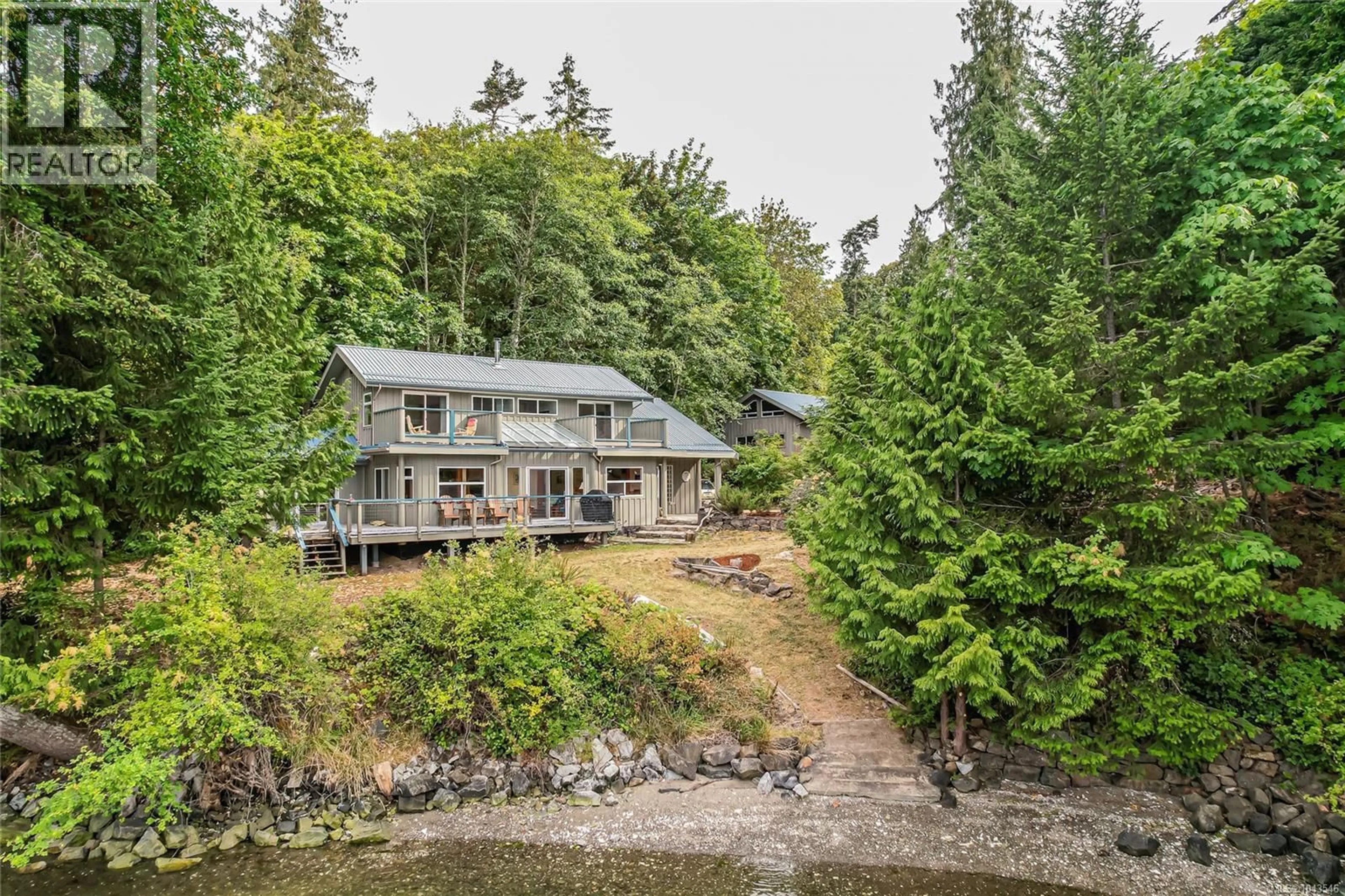 A pic from outside/outdoor area/front of a property/back of a property/a pic from drone, water/lake/river/ocean view for 115 GRANTVILLE STREET, Salt Spring British Columbia V8K1N9