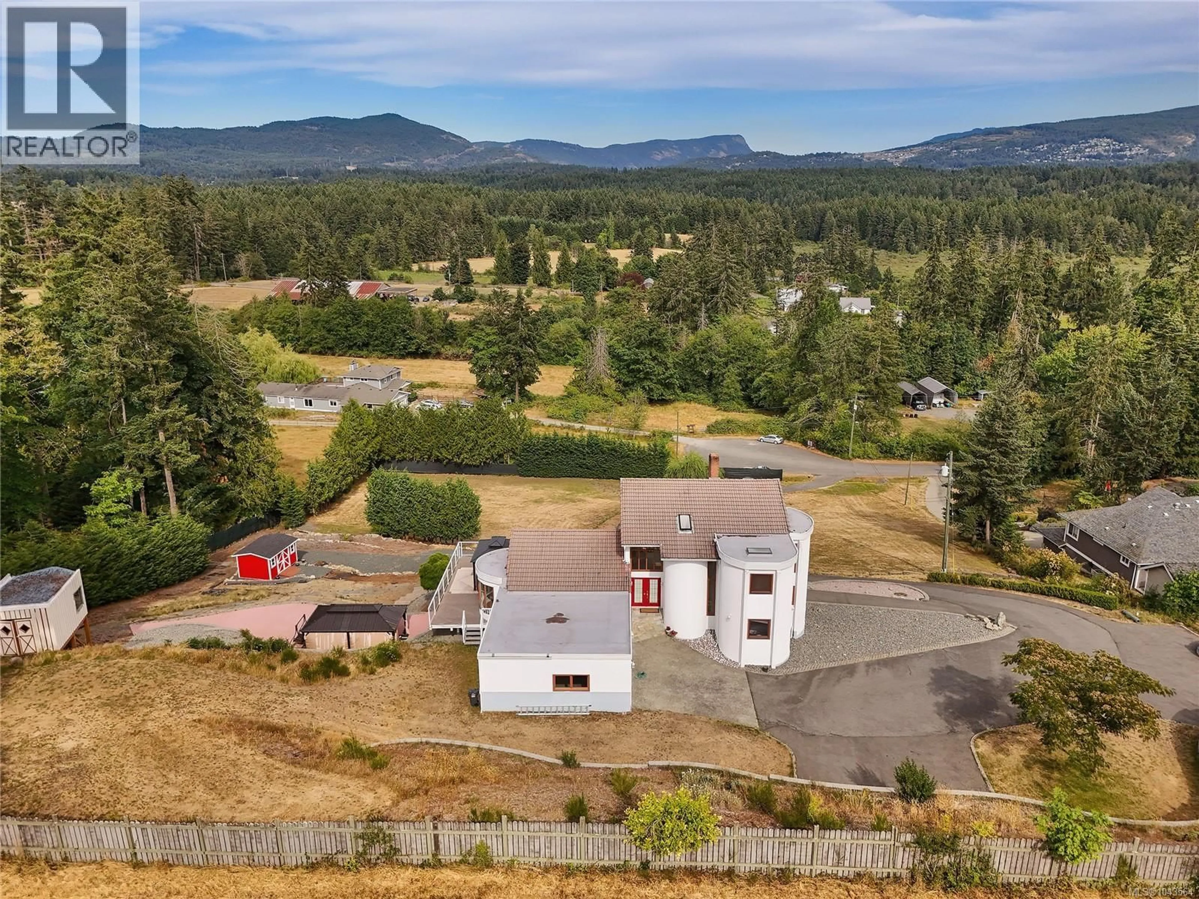 A pic from outside/outdoor area/front of a property/back of a property/a pic from drone, mountain view for 6722 ANZIO ROAD, Duncan British Columbia V9L6C4