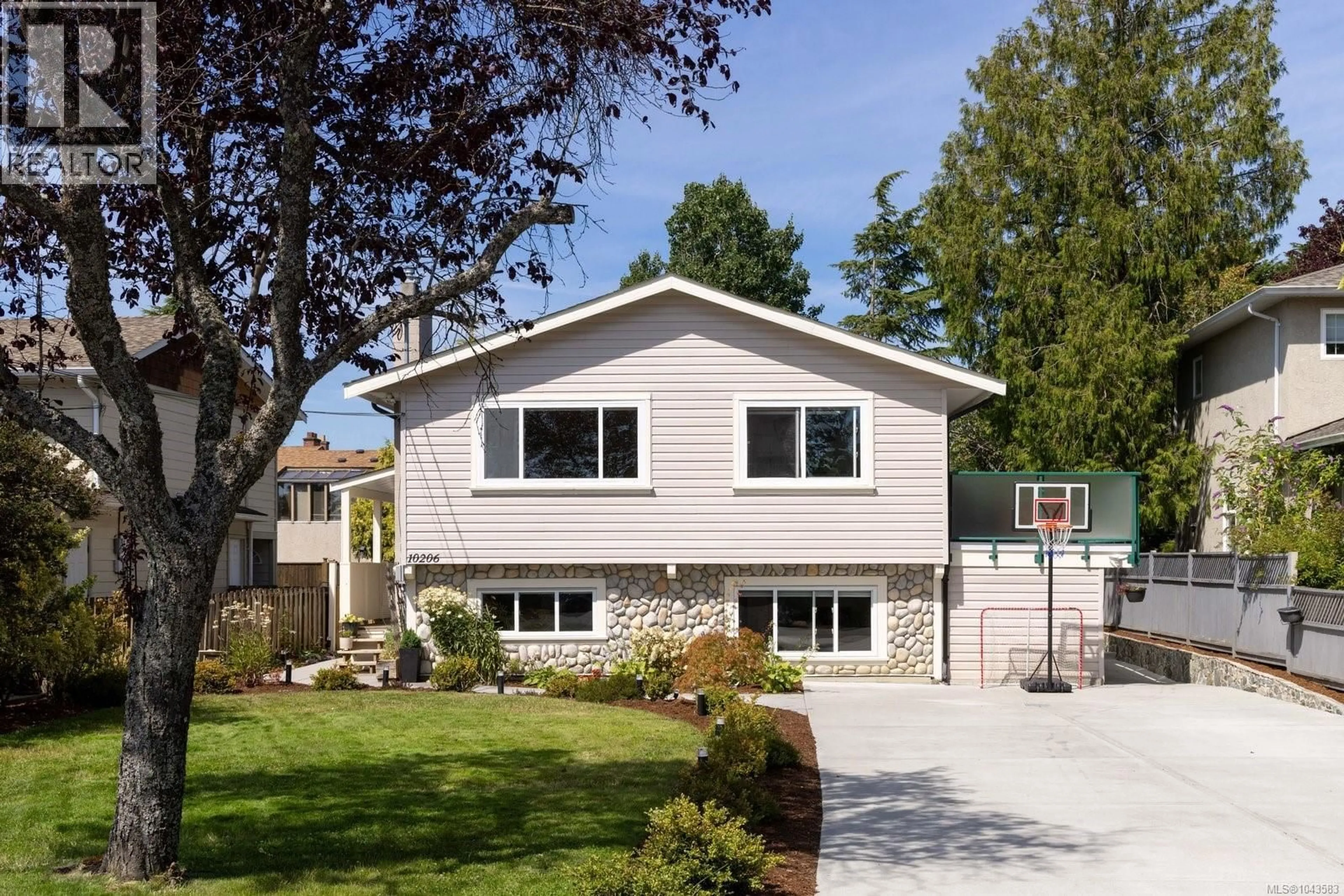 Home with vinyl exterior material, street for 10206 ALMOND STREET, Sidney British Columbia V8L3N3
