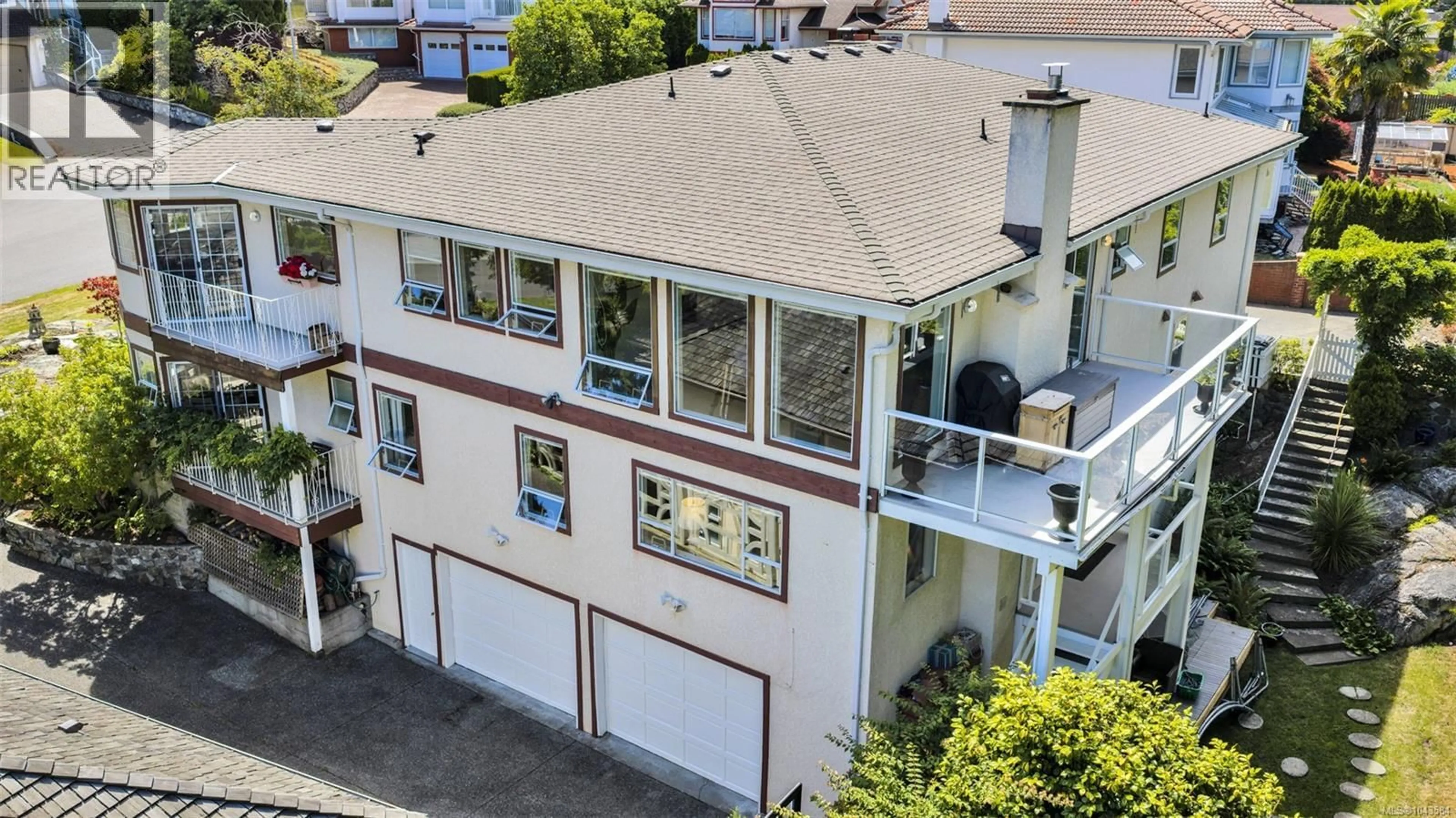 A pic from outside/outdoor area/front of a property/back of a property/a pic from drone, unknown for 1110 TOTEM LANE, Saanich British Columbia V8Y1E8