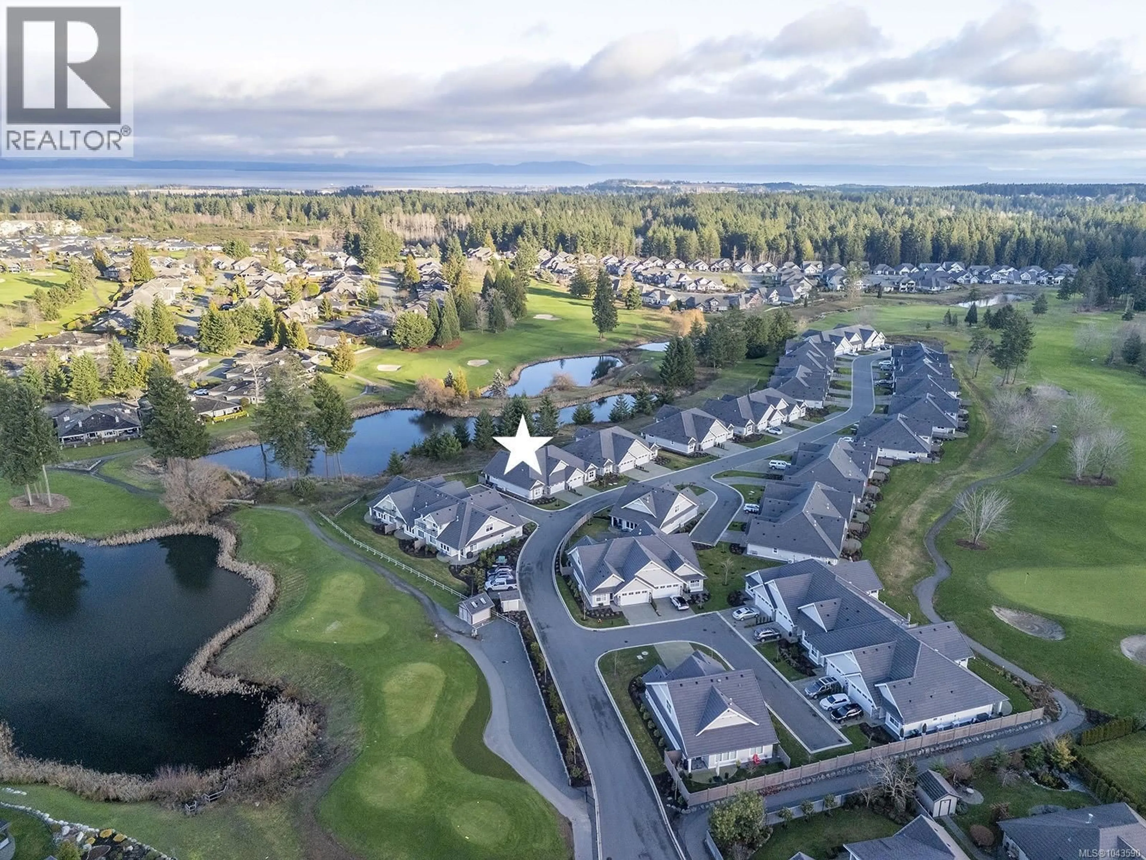 A pic from outside/outdoor area/front of a property/back of a property/a pic from drone, water/lake/river/ocean view for 108 - 1444 CROWN ISLE DRIVE, Courtenay British Columbia V9N0B8