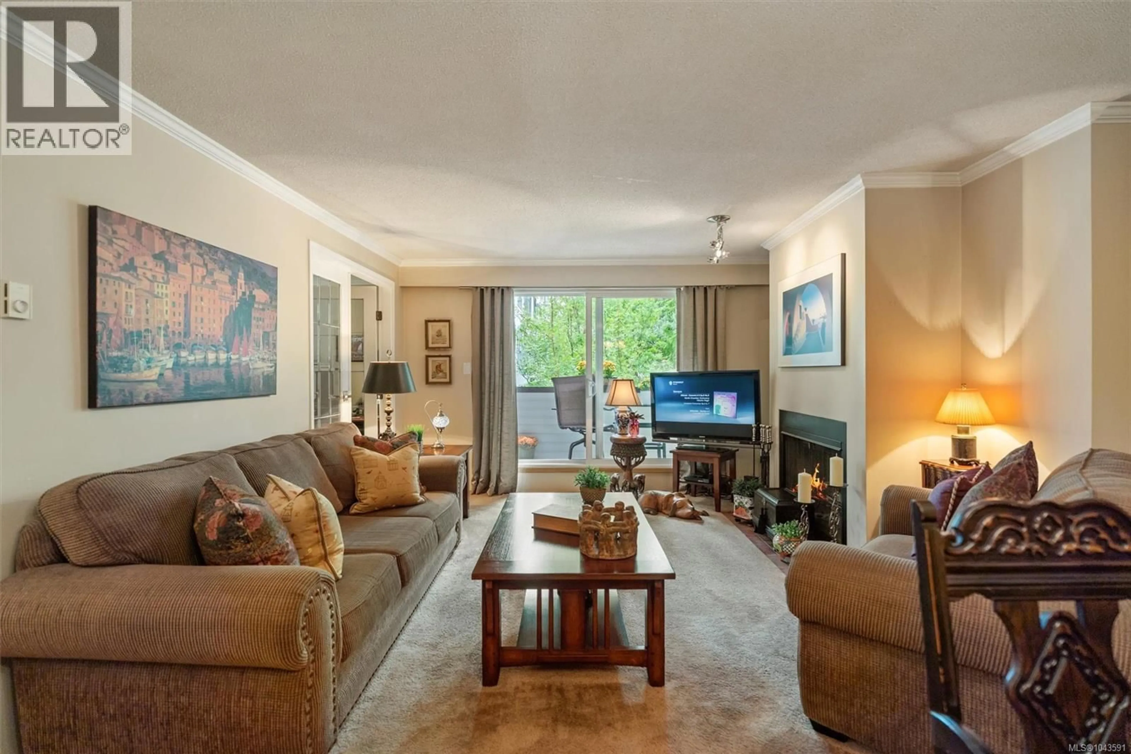 Living room with furniture, unknown for 303 - 1068 TOLMIE AVENUE, Saanich British Columbia V8X4T4